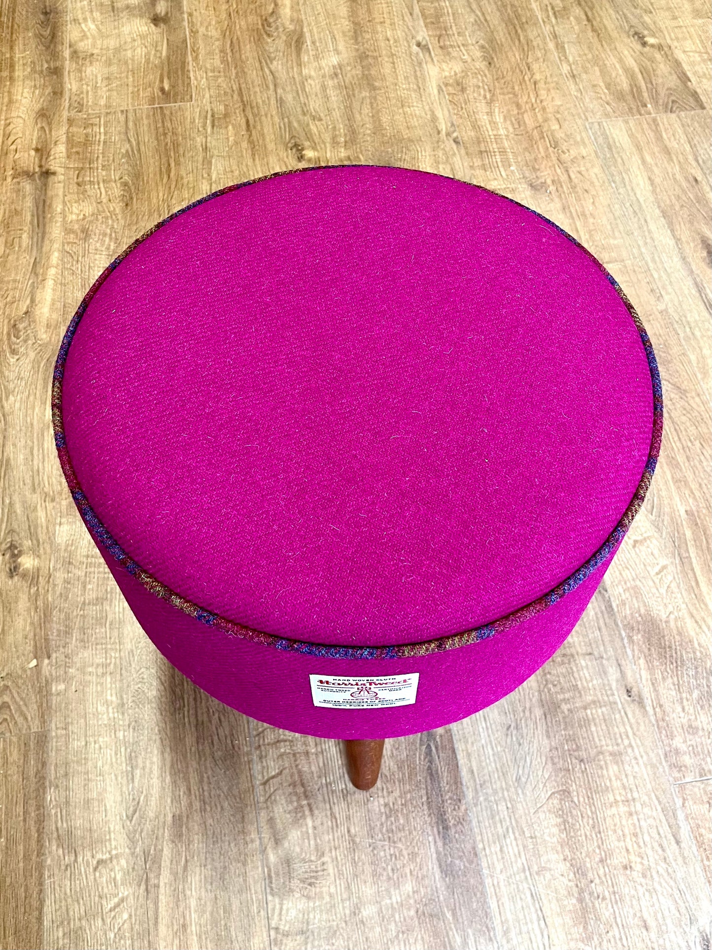 Fuchsia Harris Tweed Footstool with Tartan Piping and Dark Varnished Wooden Legs