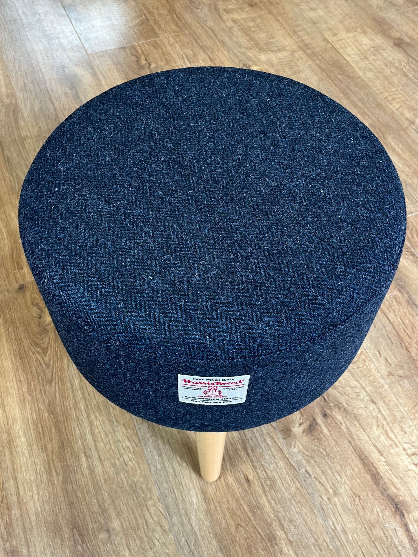 Navy Blue Harris Tweed Upholstered Footstool with Varnished Wooden Legs.