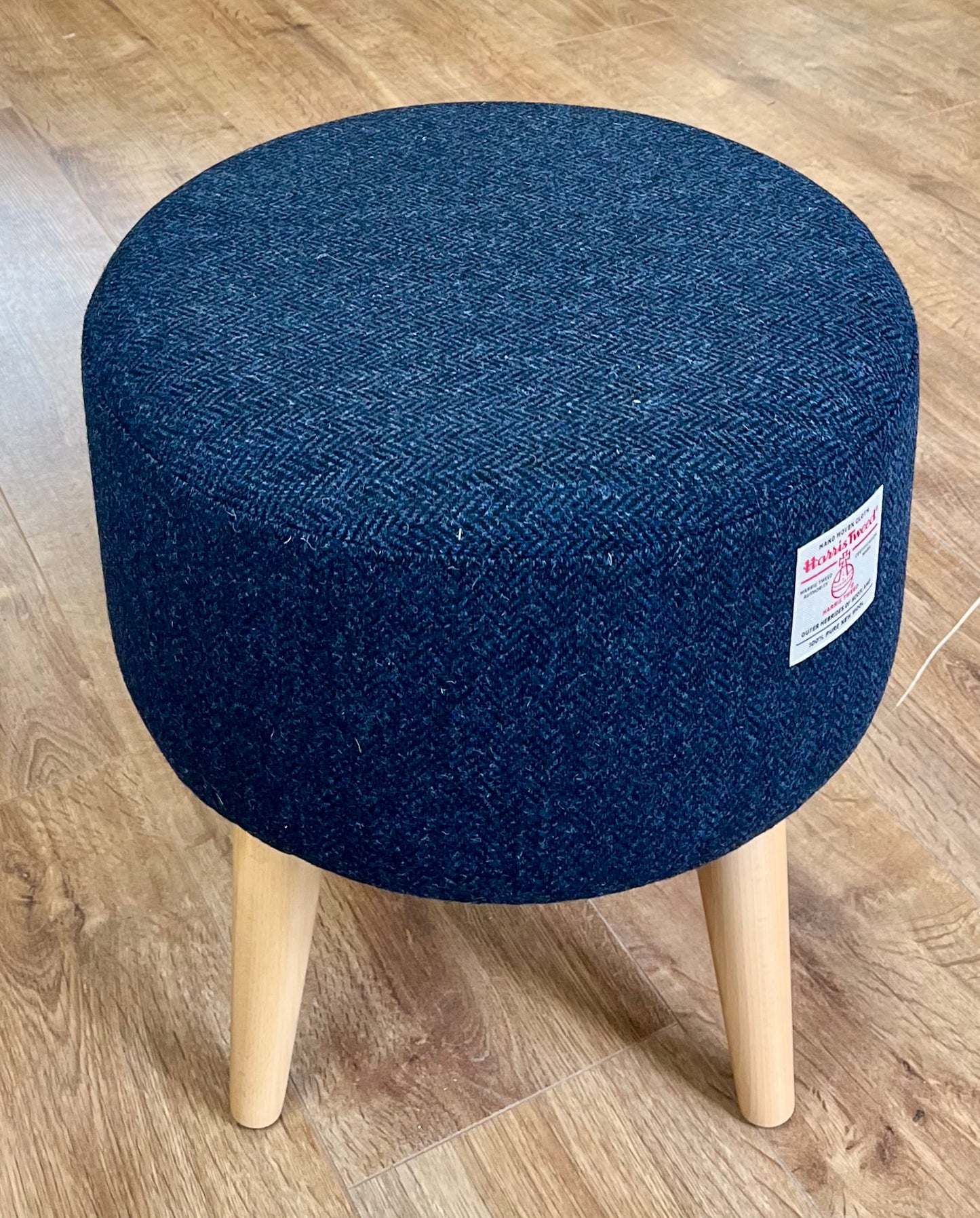 Navy Blue Harris Tweed Upholstered Footstool with Varnished Wooden Legs.
