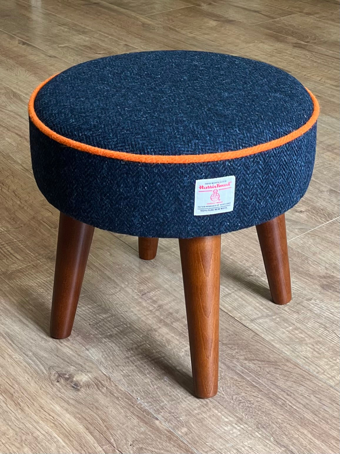 Navy Blue Harris Tweed Footstool with Orange Piping and Dark Varnished Wooden Legs