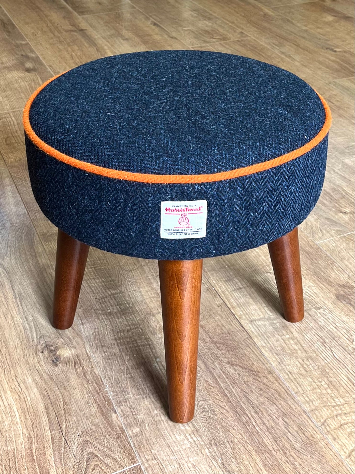 Navy Blue Harris Tweed Footstool with Orange Piping and Dark Varnished Wooden Legs