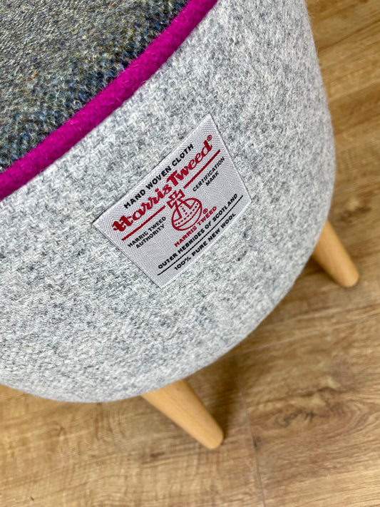 Grey and Charcoal Harris Tweed Footstool with Fuchsia Piping and Varnished Wooden Legs