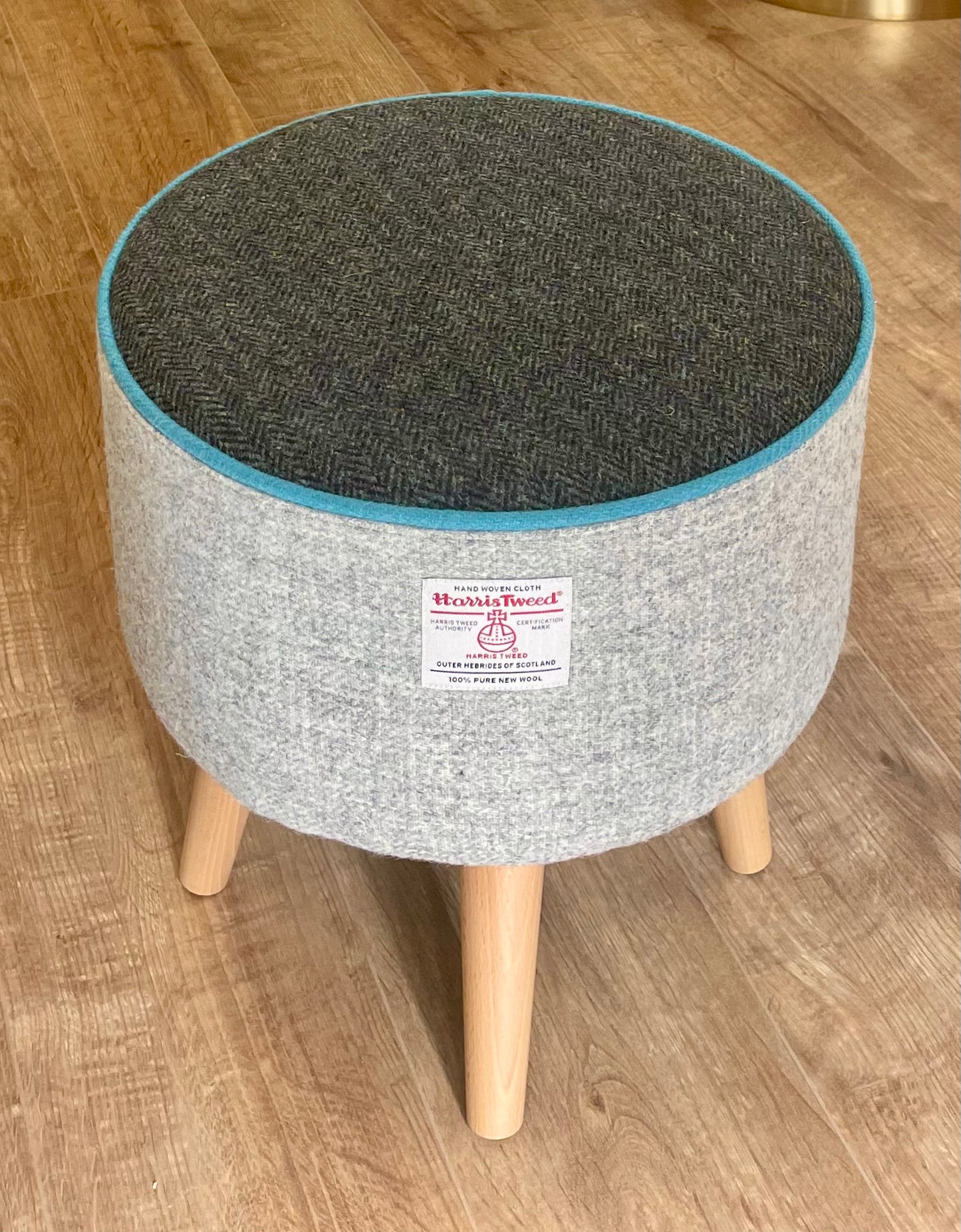 Grey and Charcoal Harris Tweed Footstool with Turquoise Piping and Dark Varnished Wooden Legs