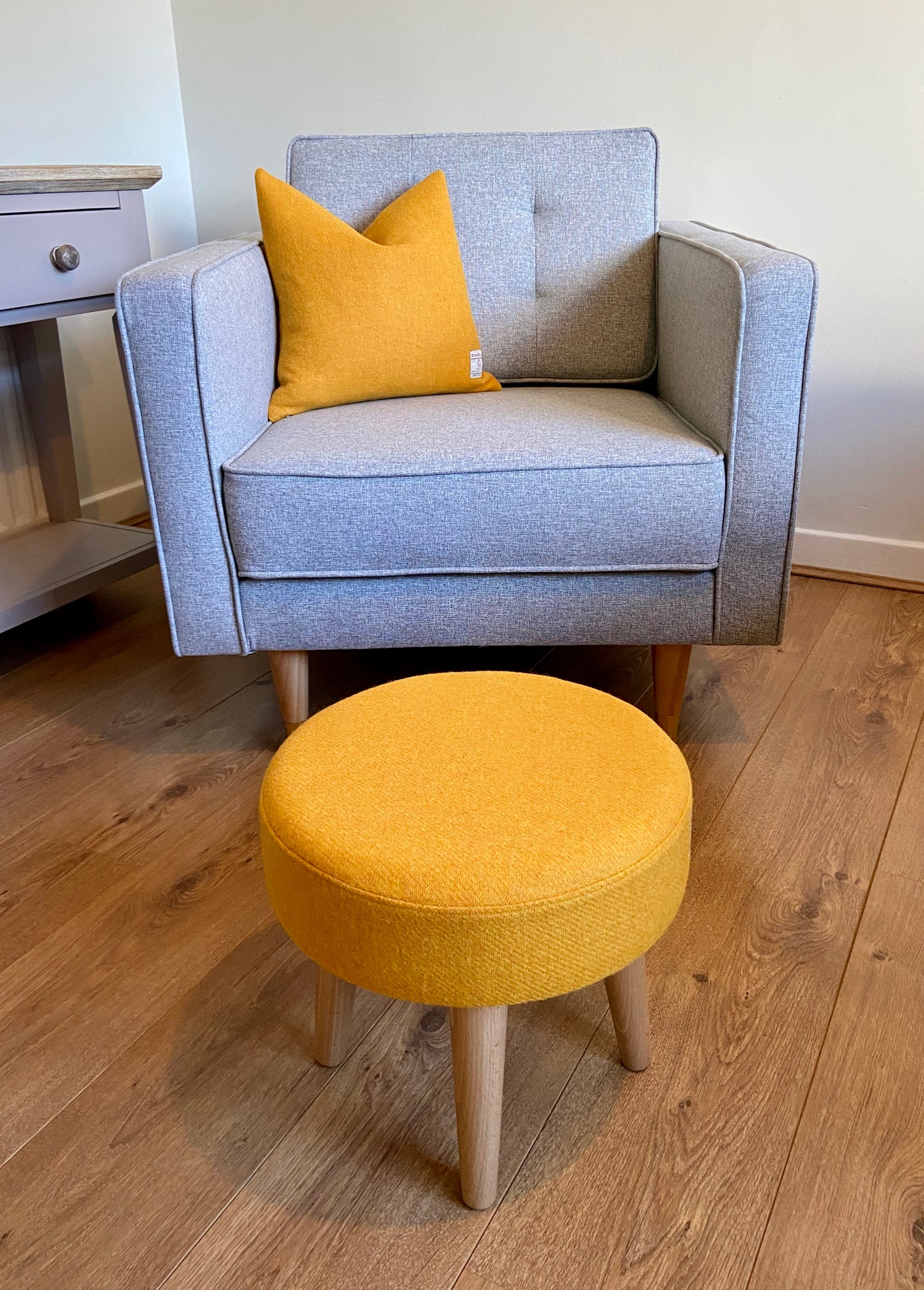 Yellow Harris Tweed Footstool with Dark Varnished Wooden Legs