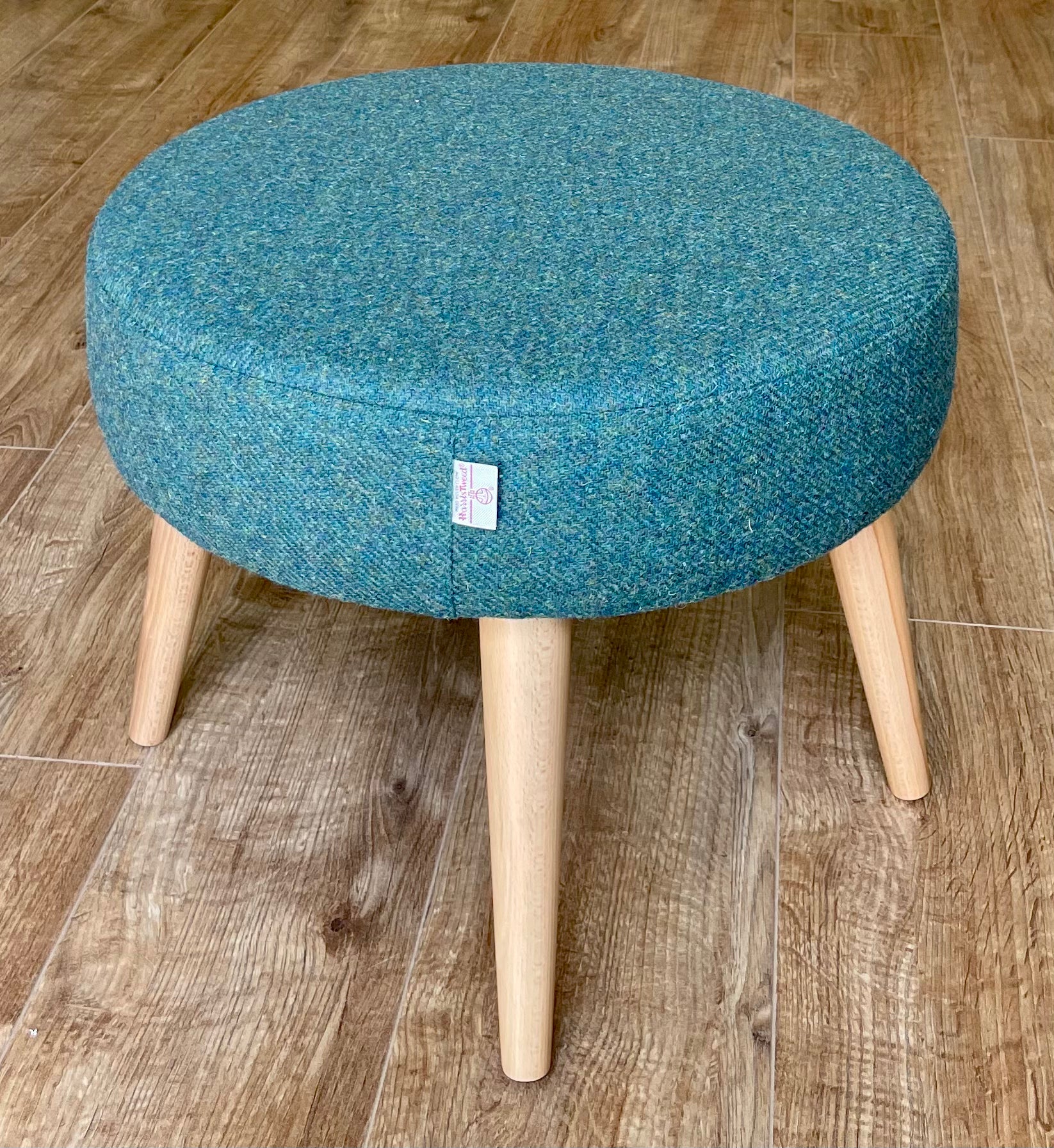 Green Harris Tweed Wide Round Footstool with Light Wooden Legs