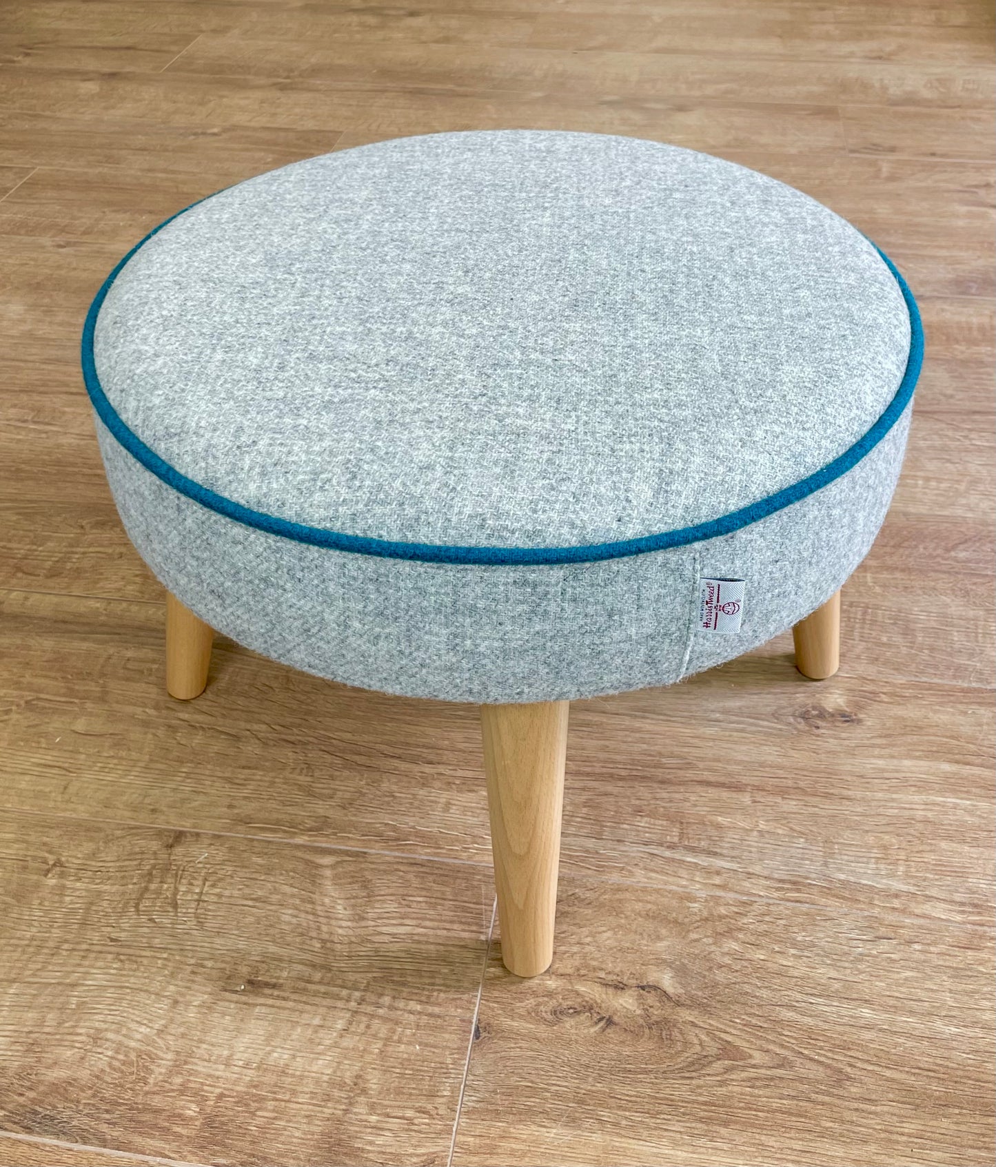 Grey Harris Tweed Wide Round Footstool with Teal Piping