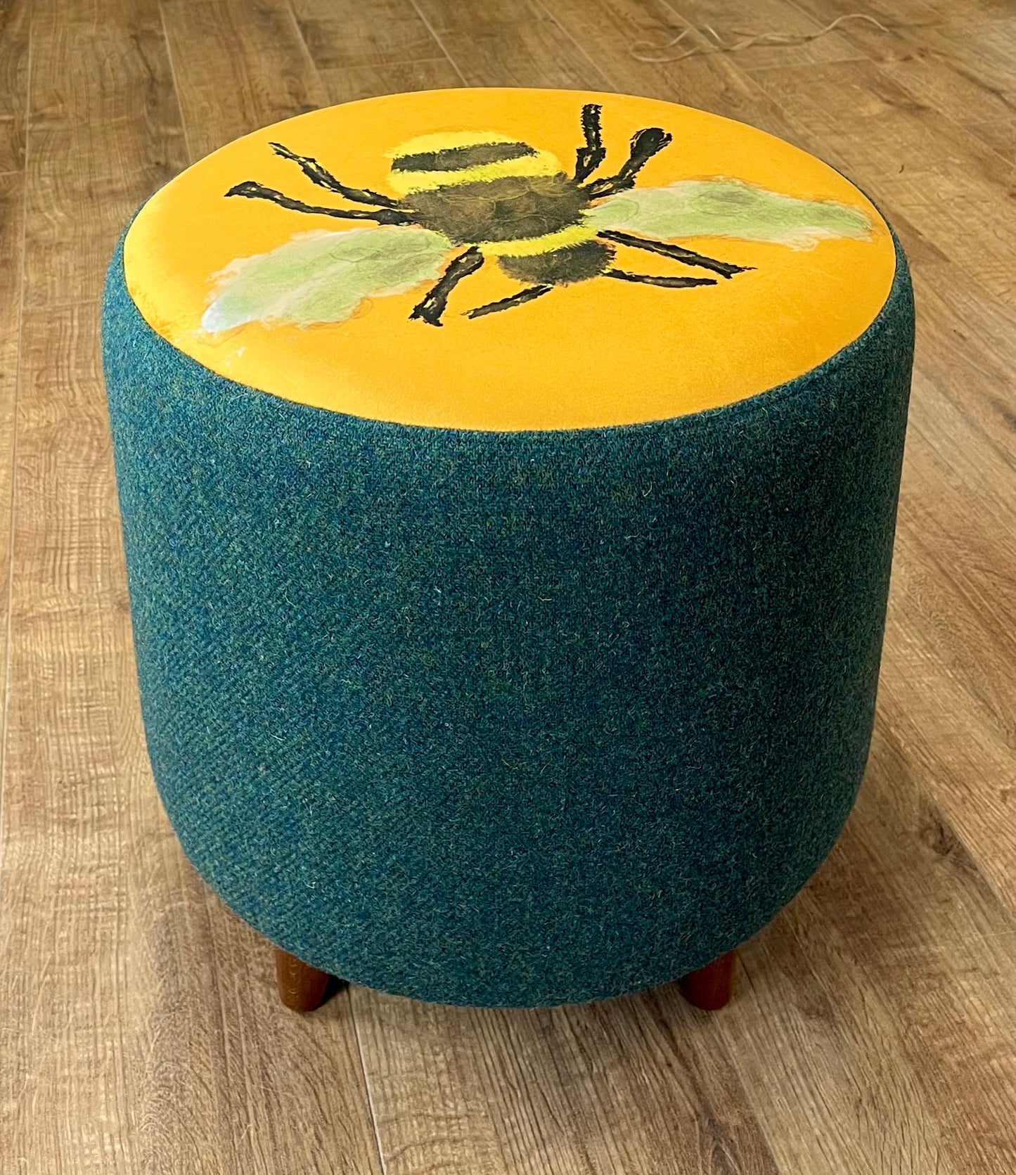 Bumble Bee Velvet Footstool with Green Harris Tweed with Dark Wooden Mini Feet