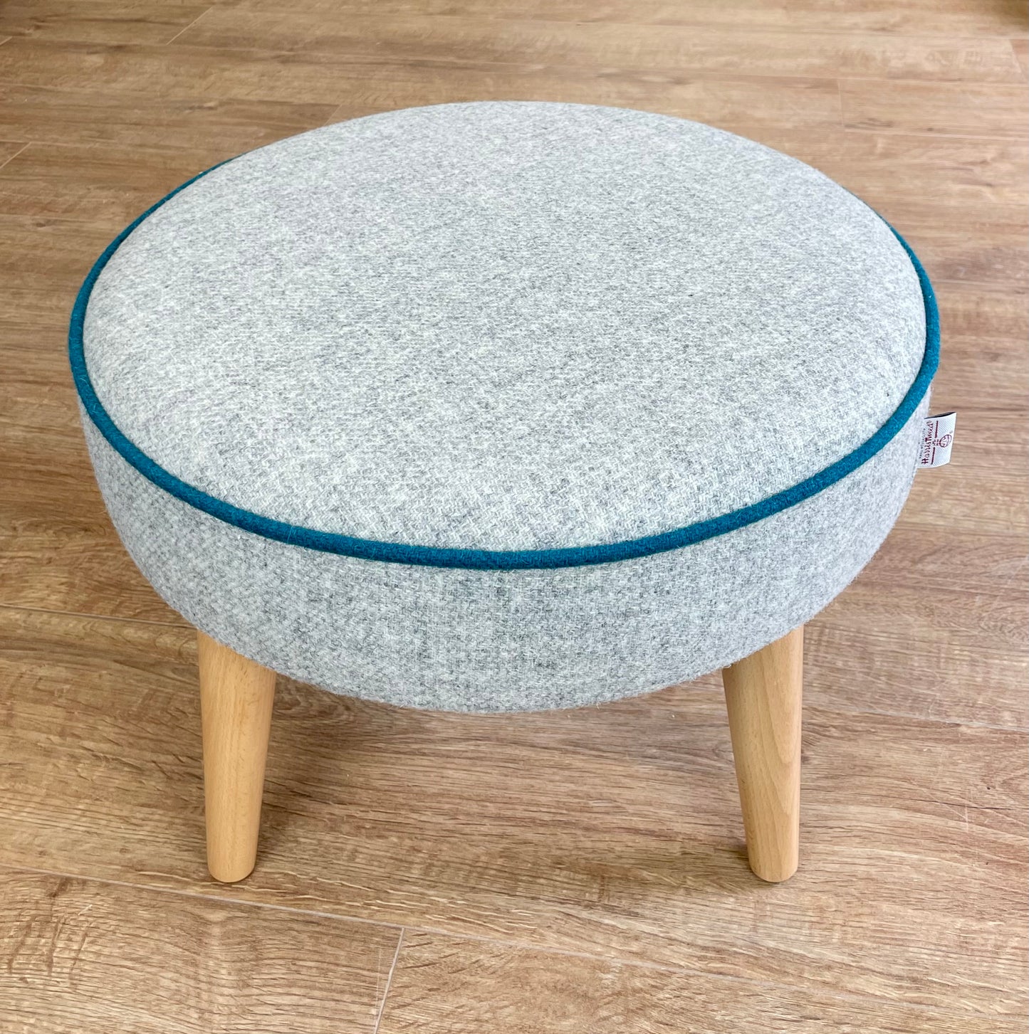 Grey Harris Tweed Wide Round Footstool with Teal Piping