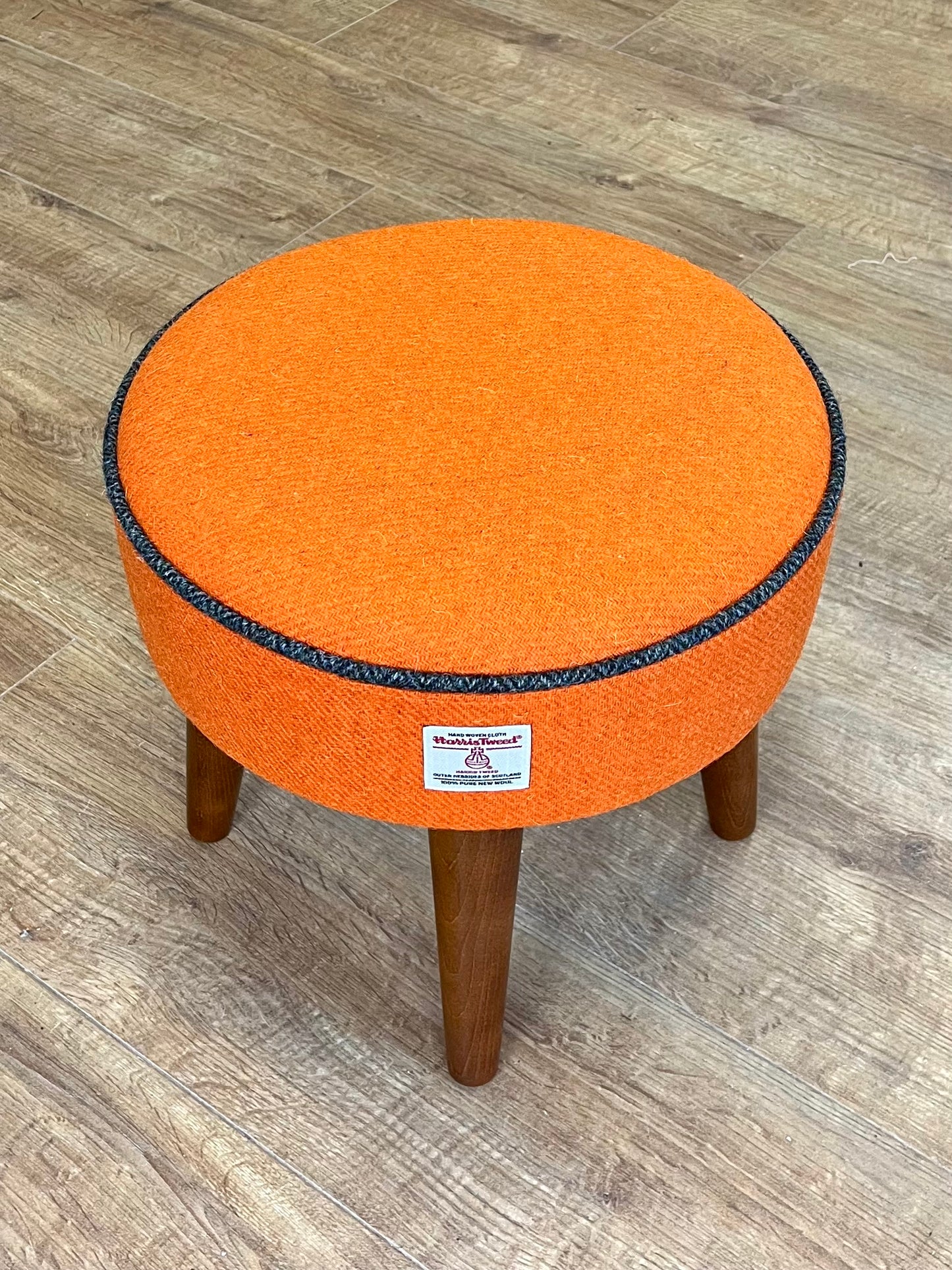 Orange Harris Tweed Footstool with Charcoal Piping and Dark Varnished Wooden Legs