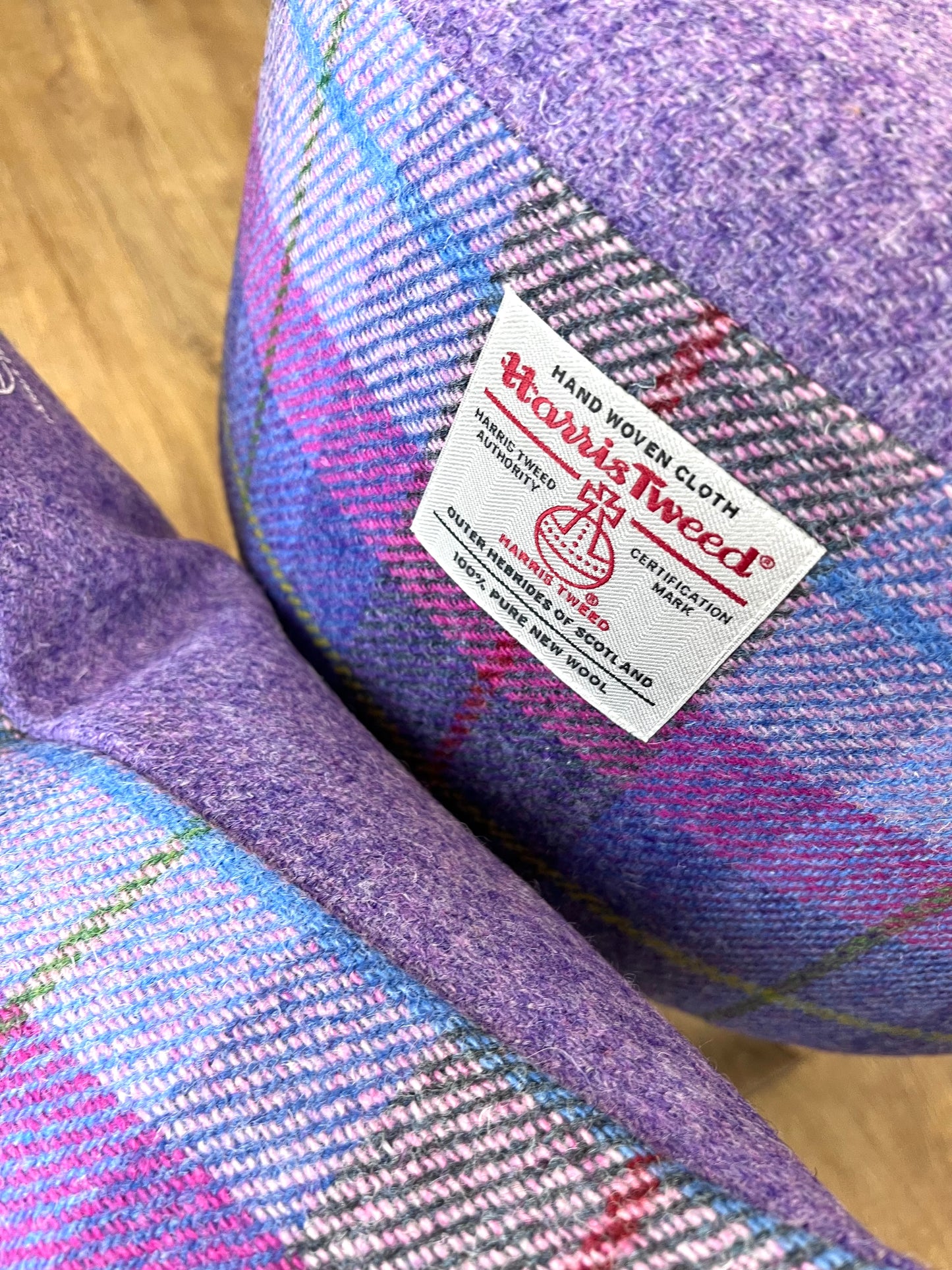 Lilac and Tartan Harris Tweed Round Footstool with Varnished Wooden Legs