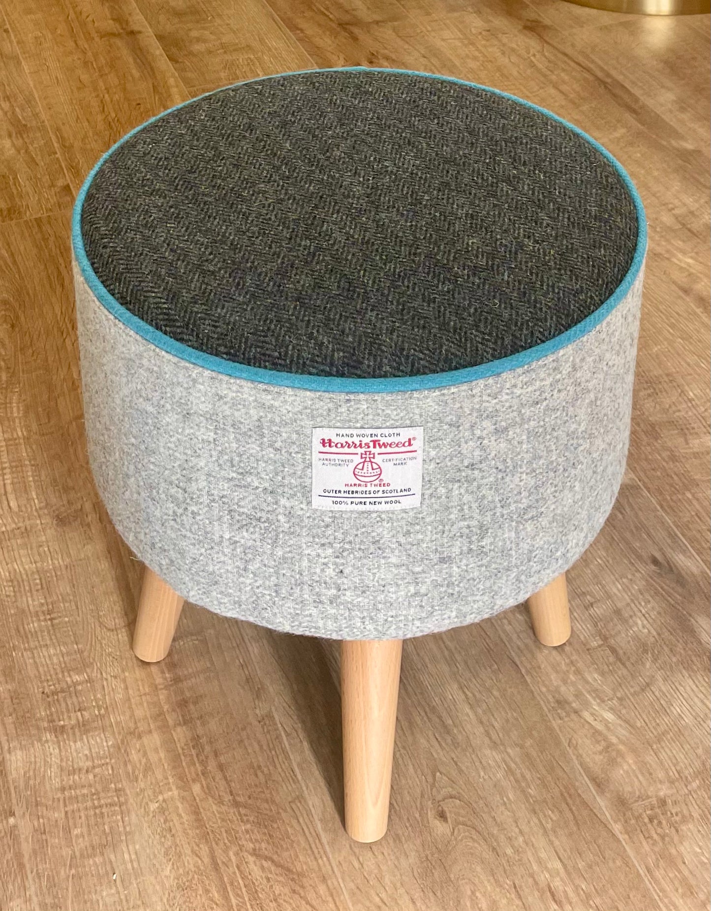 Grey and Charcoal Harris Tweed Footstool with Turquoise Piping and Dark Varnished Wooden Legs