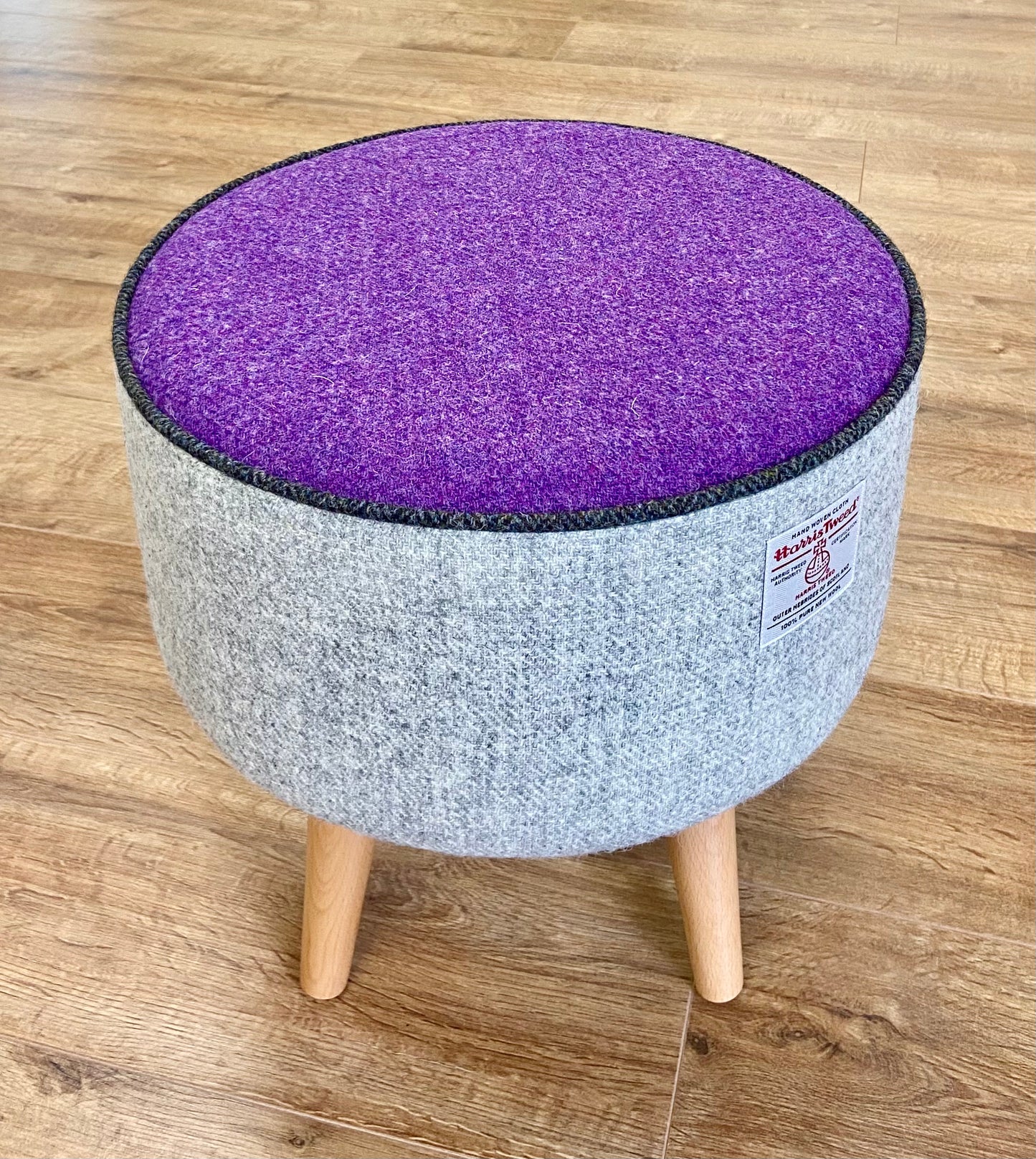 Grey and Purple Harris Tweed Footstool with Charcoal Piping and Varnished Wooden Legs