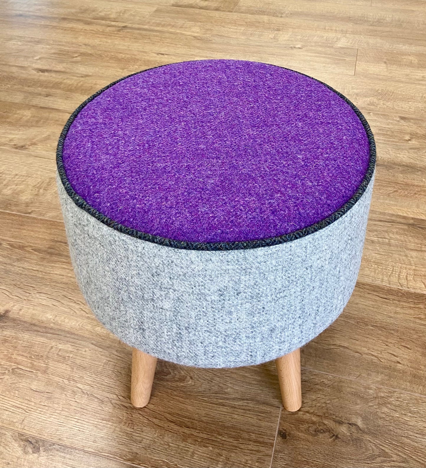 Grey and Purple Harris Tweed Footstool with Charcoal Piping and Varnished Wooden Legs