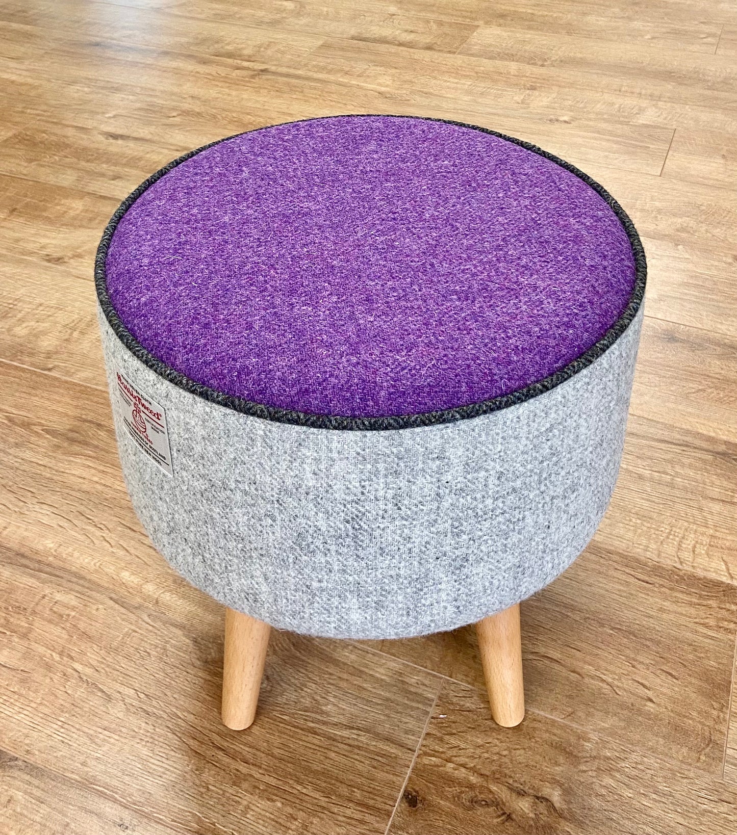 Grey and Purple Harris Tweed Footstool with Charcoal Piping and Varnished Wooden Legs