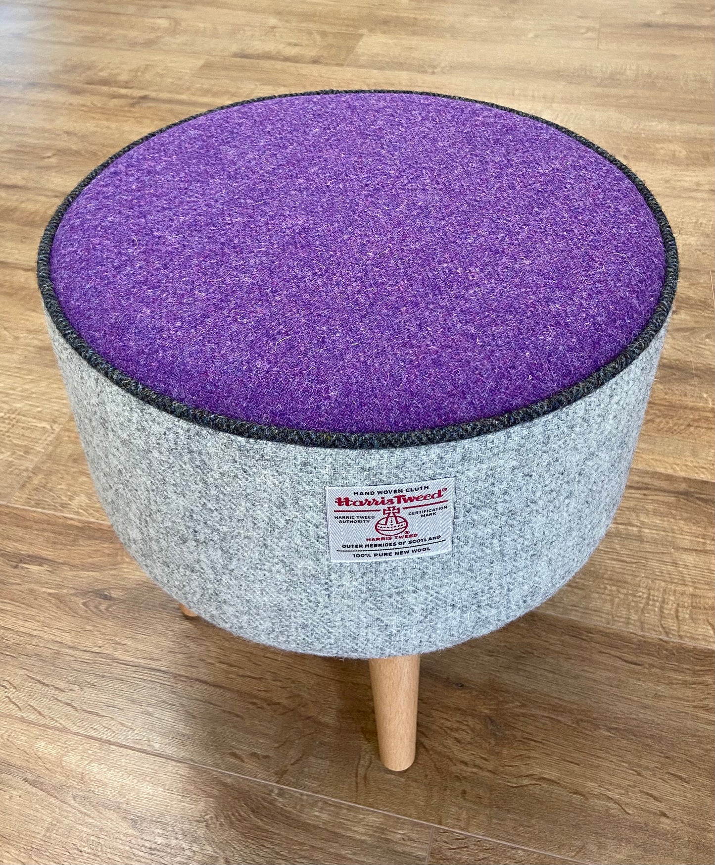 Grey and Purple Harris Tweed Footstool with Charcoal Piping and Varnished Wooden Legs