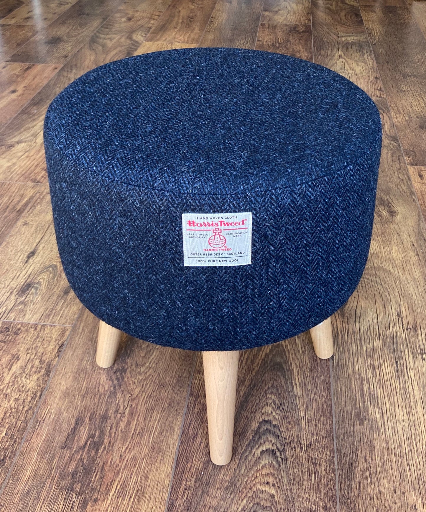 Navy Blue Harris Tweed Upholstered Footstool with Varnished Wooden Legs.