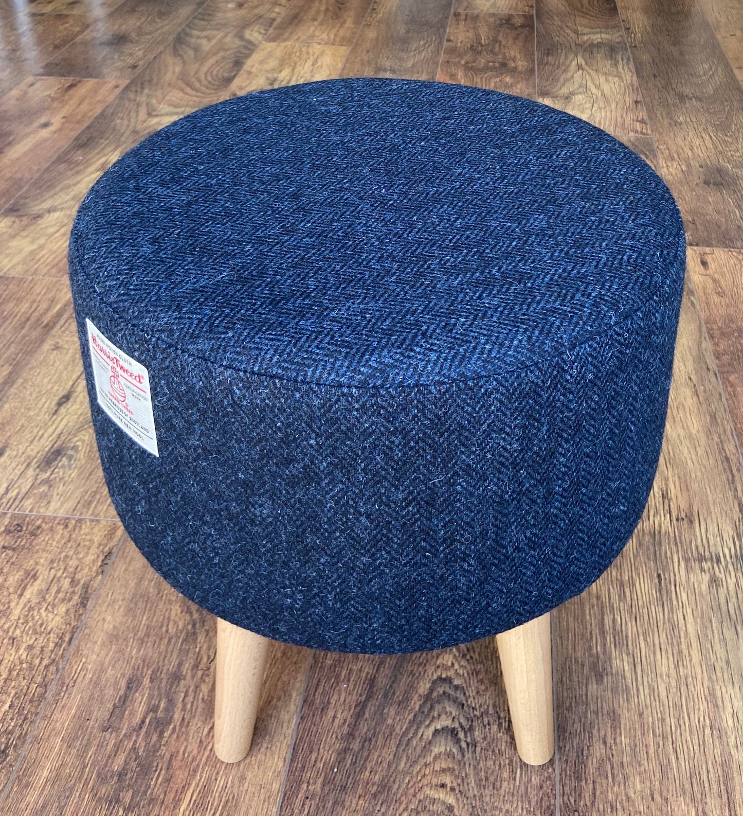 Navy Blue Harris Tweed Upholstered Footstool with Varnished Wooden Legs.