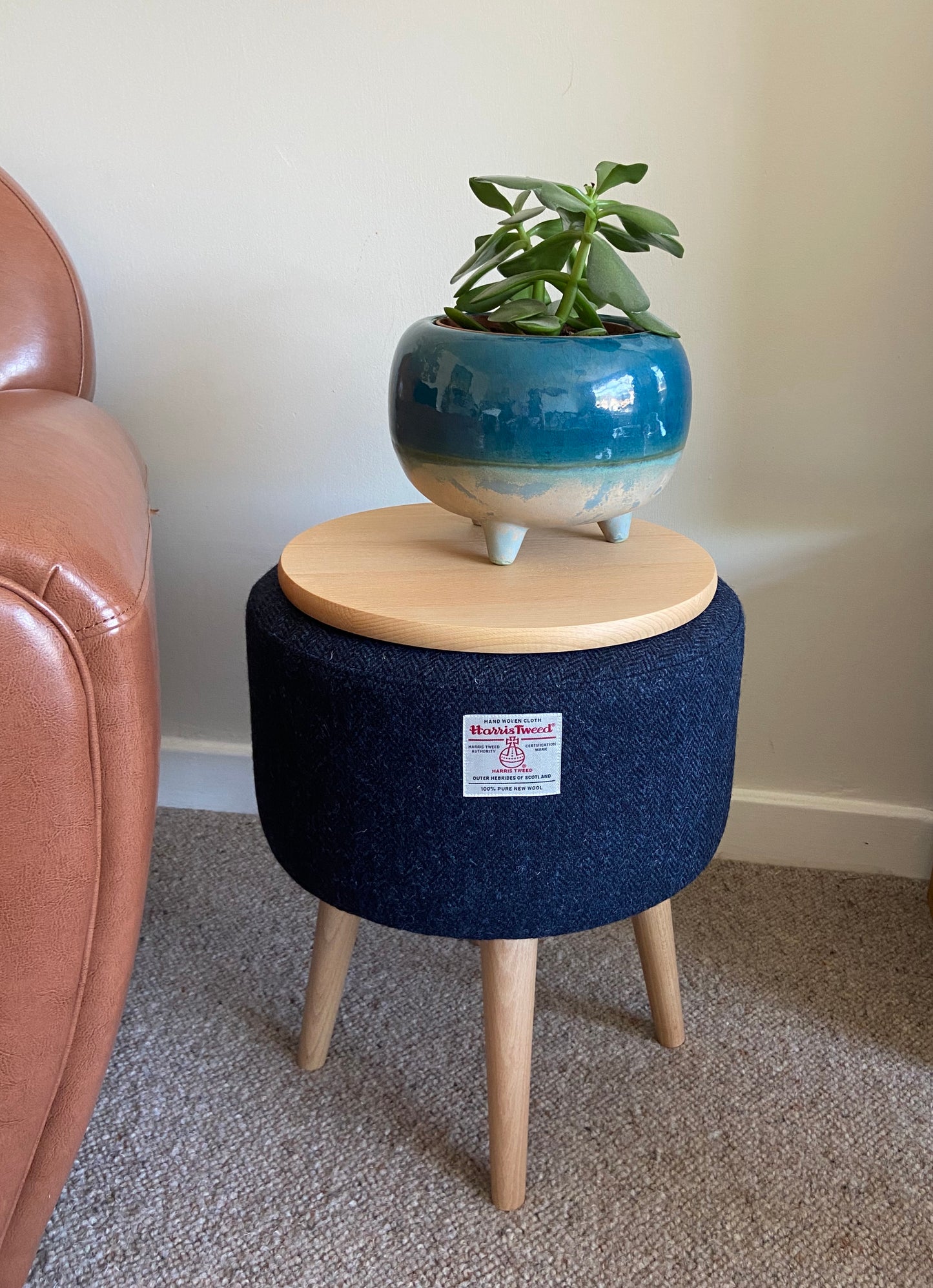 Navy Blue Harris Tweed Upholstered Footstool with Varnished Wooden Legs.