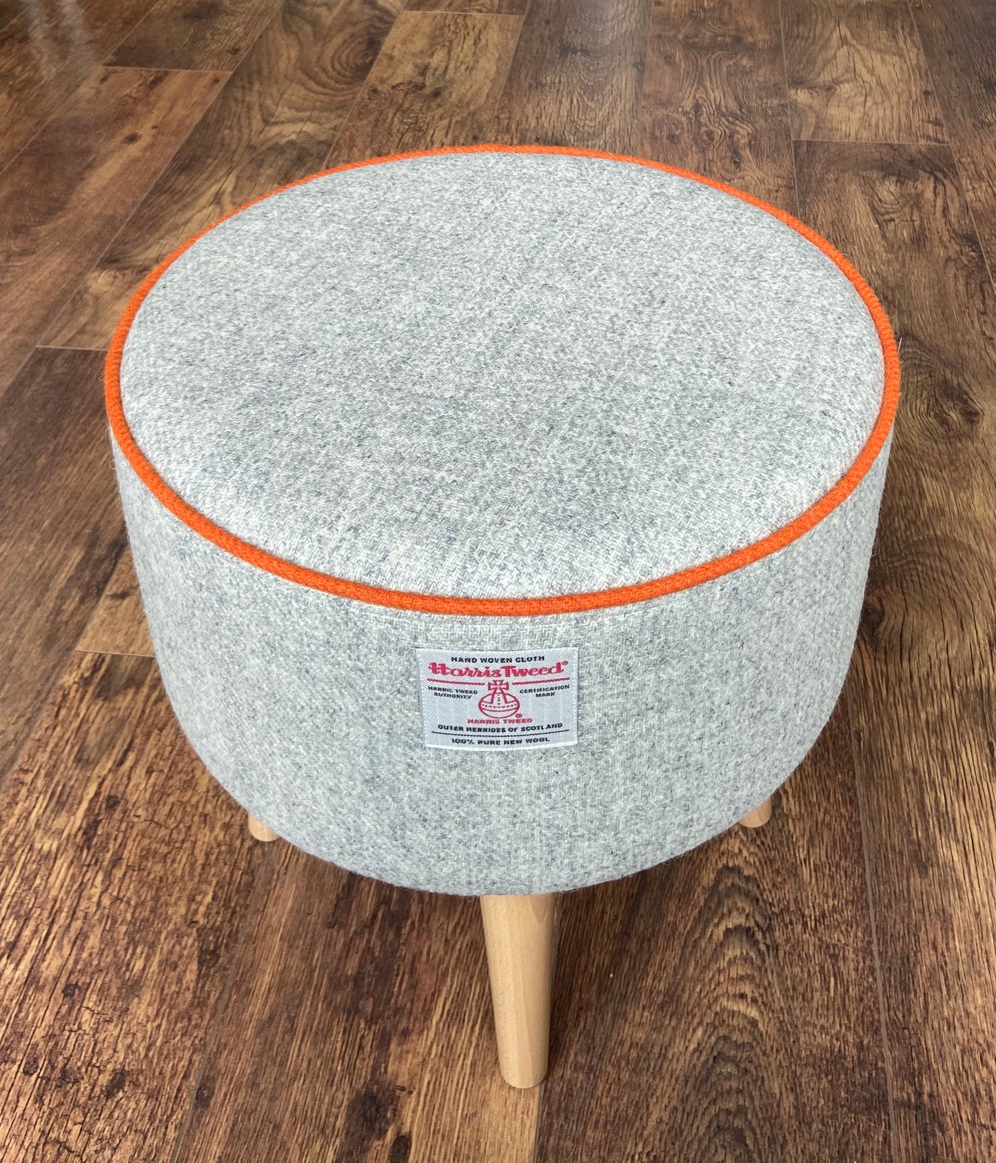 Grey Harris Tweed Footstool with Orange Piping and Varnished Wooden Legs