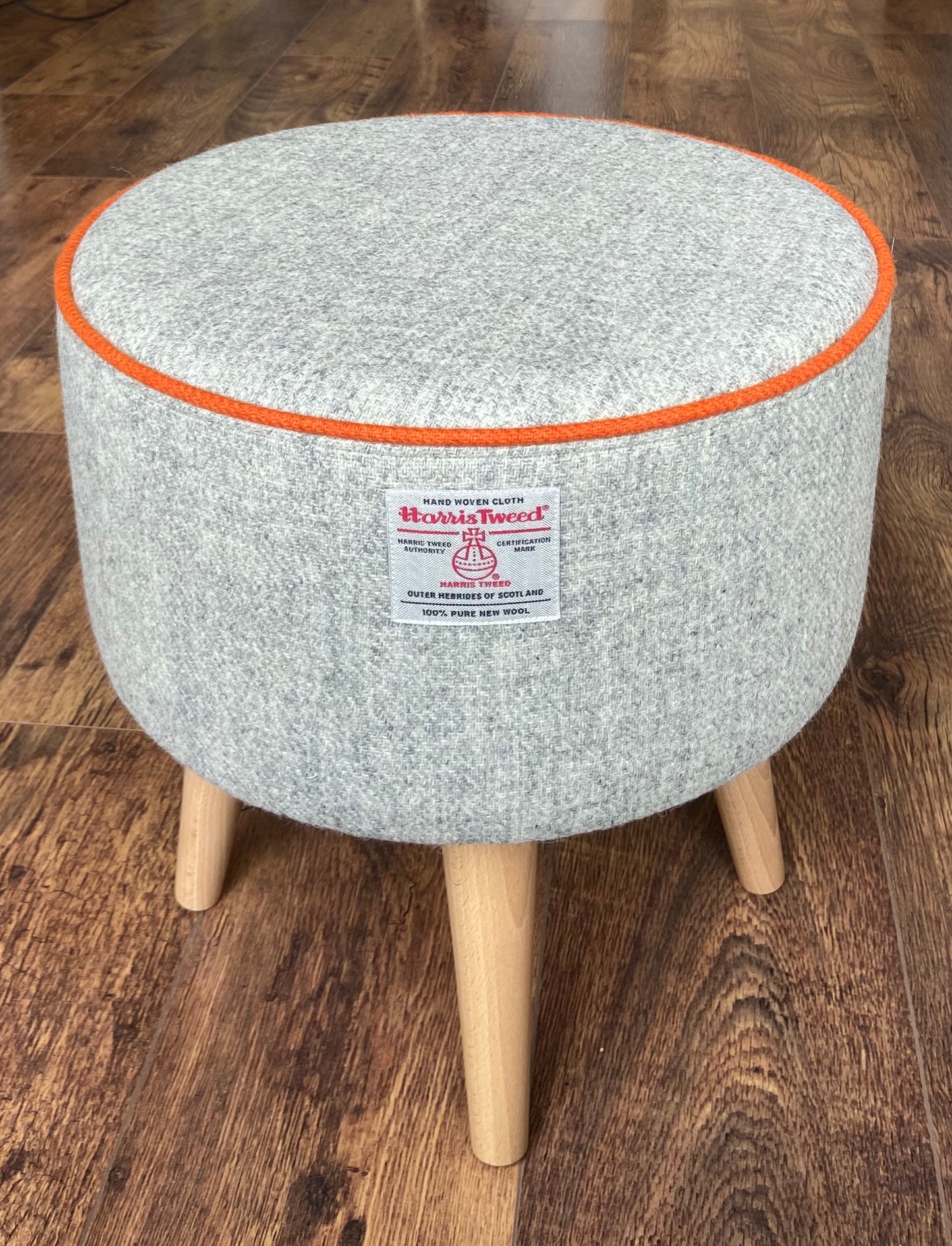 Grey Harris Tweed Footstool with Orange Piping and Varnished Wooden Legs