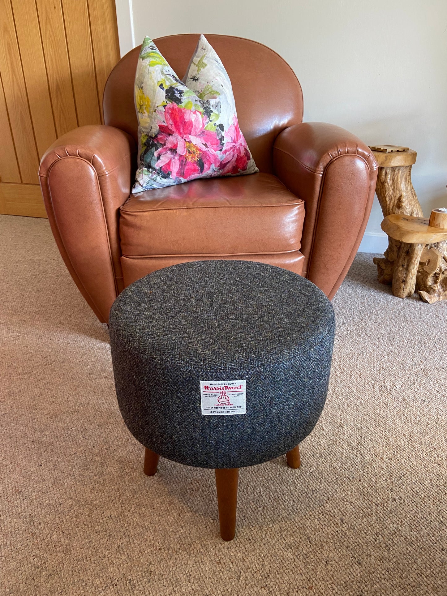 Charcoal Harris Tweed Upholstered Footstool with Dark Varnished Wooden Legs.