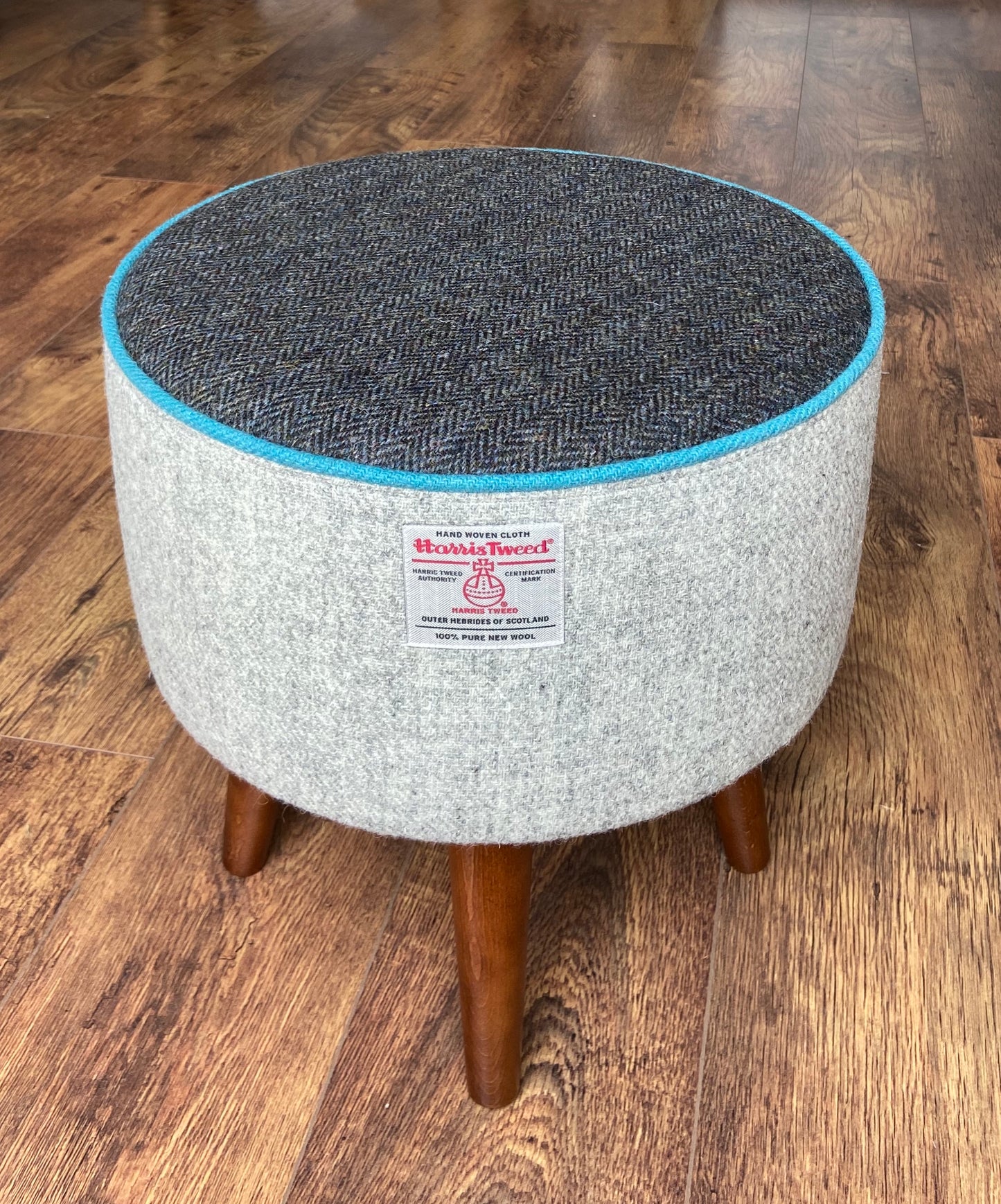 Grey and Charcoal Harris Tweed Footstool with Turquoise Piping and Dark Varnished Wooden Legs