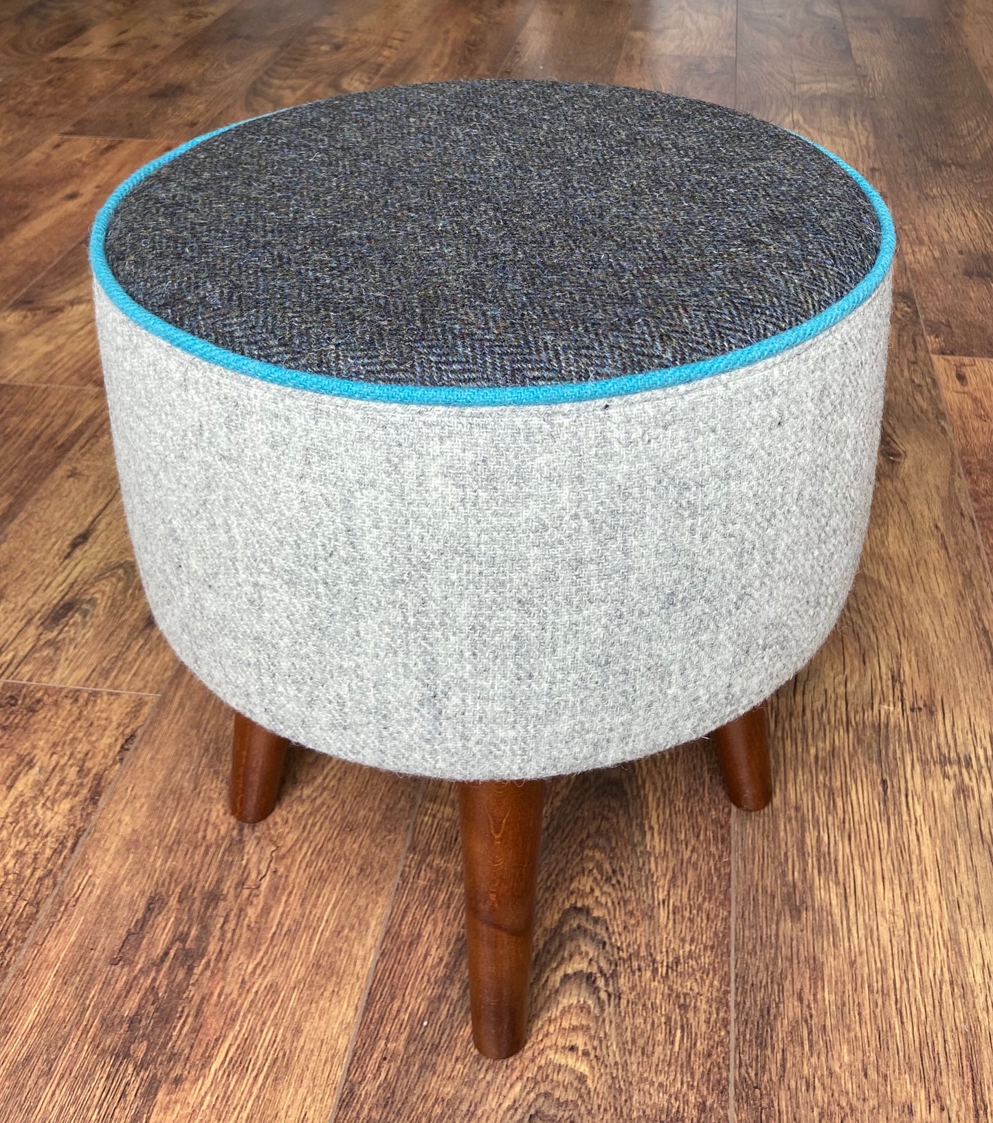 Grey and Charcoal Harris Tweed Footstool with Turquoise Piping and Dark Varnished Wooden Legs