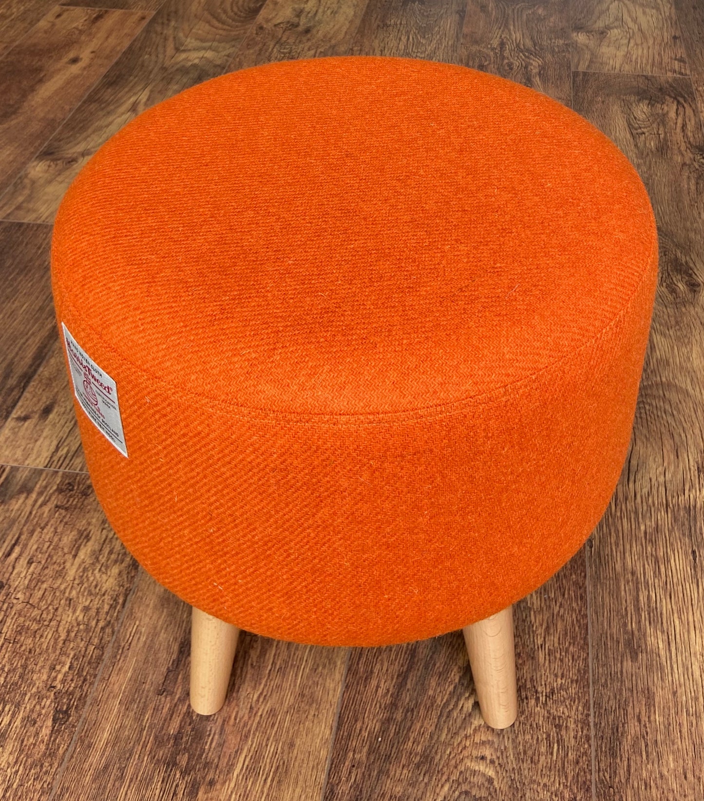 Upholstered Orange Harris Tweed Footstool with Varnished Wooden Legs