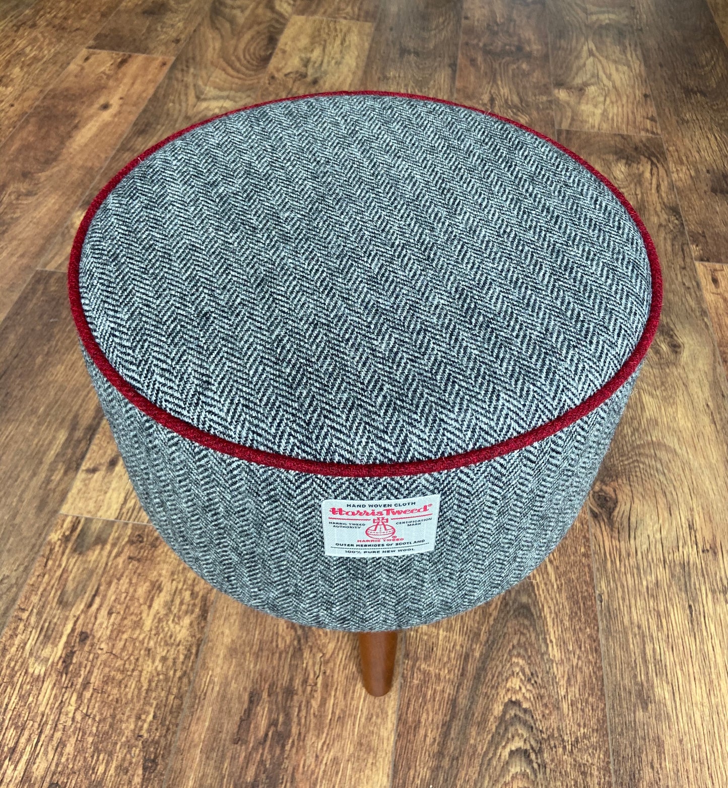 Black and White Harris Tweed Herringbone Footstool with Red Piping and Dark Varnished Wooden Legs