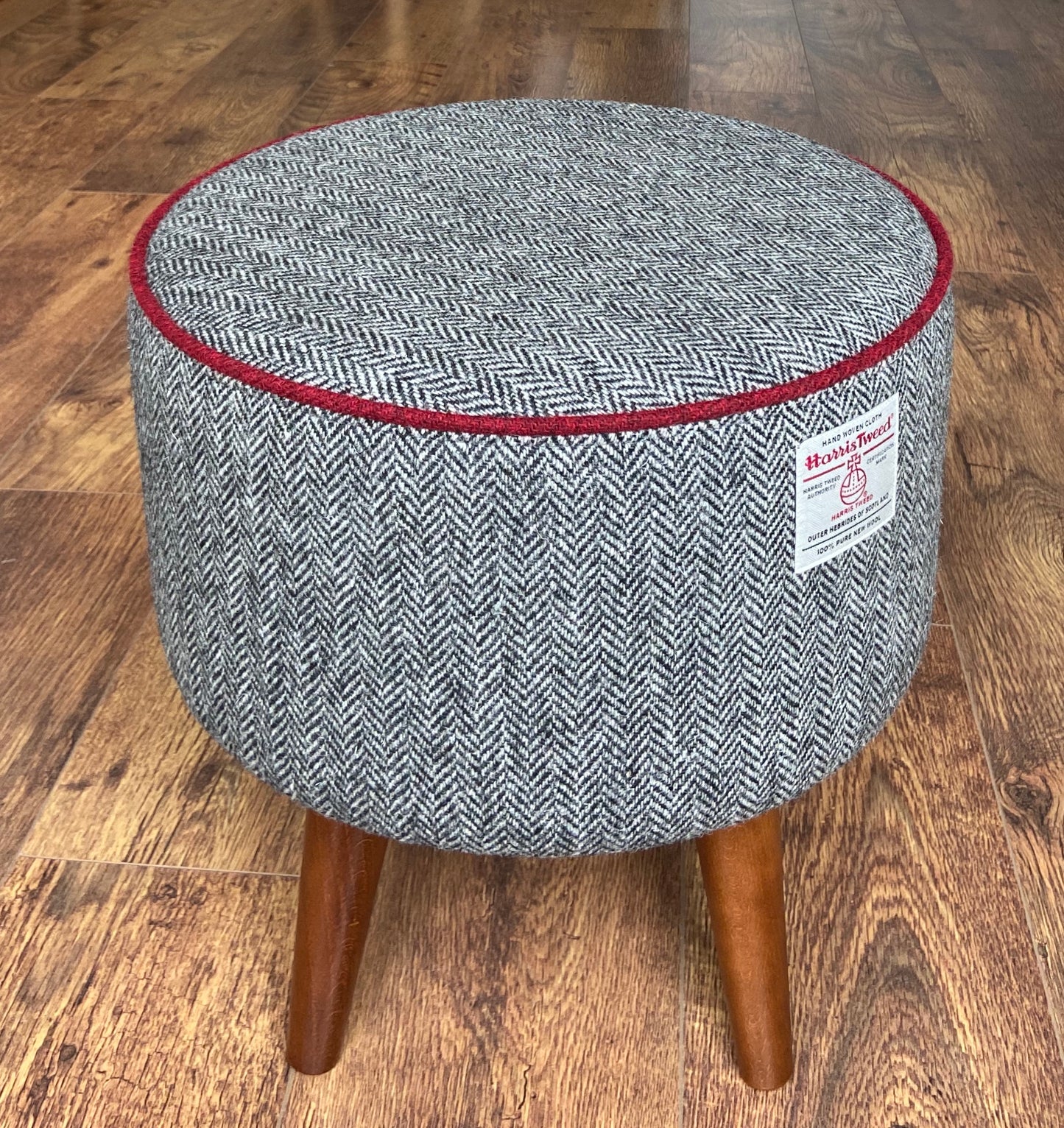 Black and White Harris Tweed Herringbone Footstool with Red Piping and Dark Varnished Wooden Legs