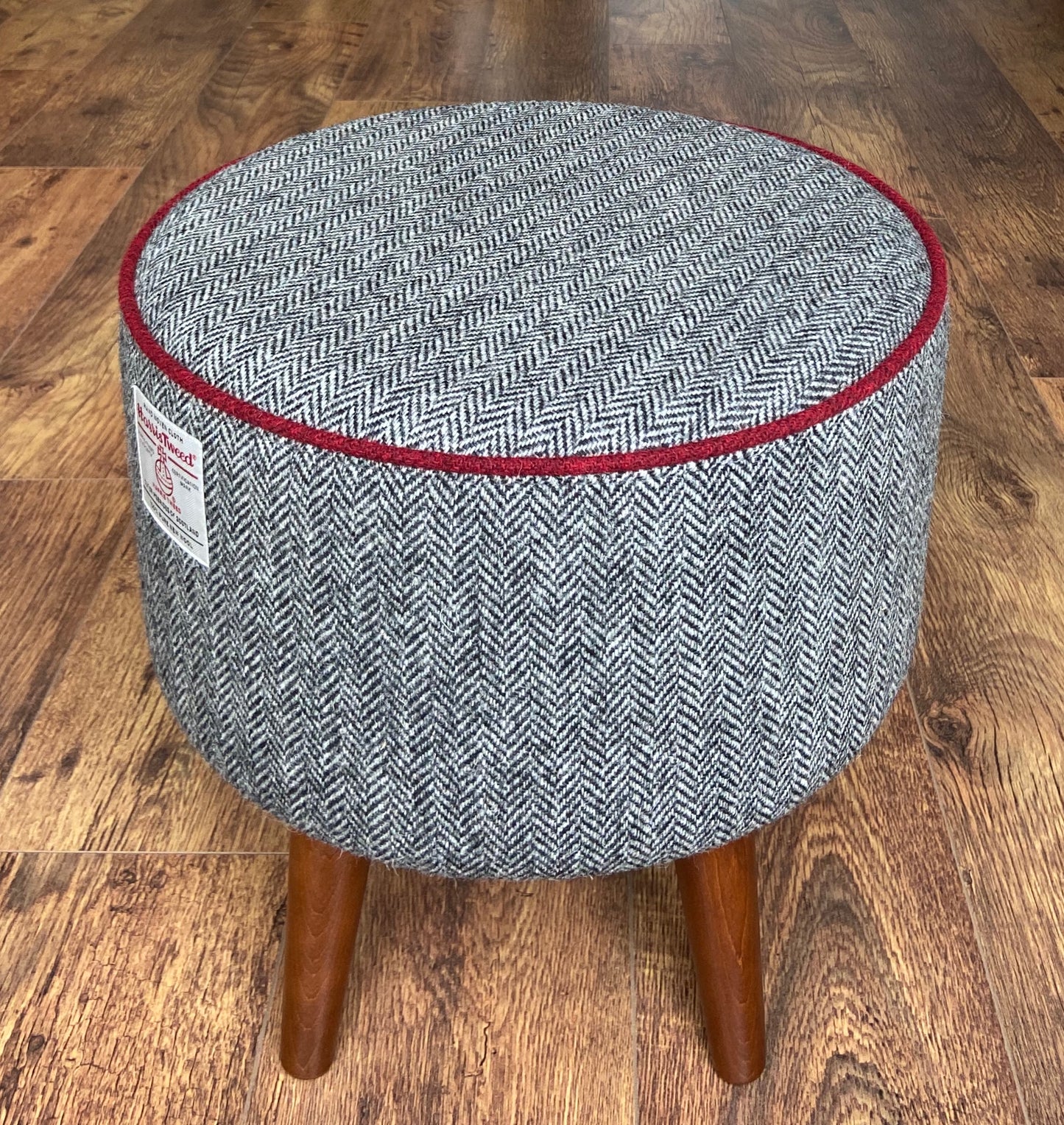 Black and White Harris Tweed Herringbone Footstool with Red Piping and Dark Varnished Wooden Legs