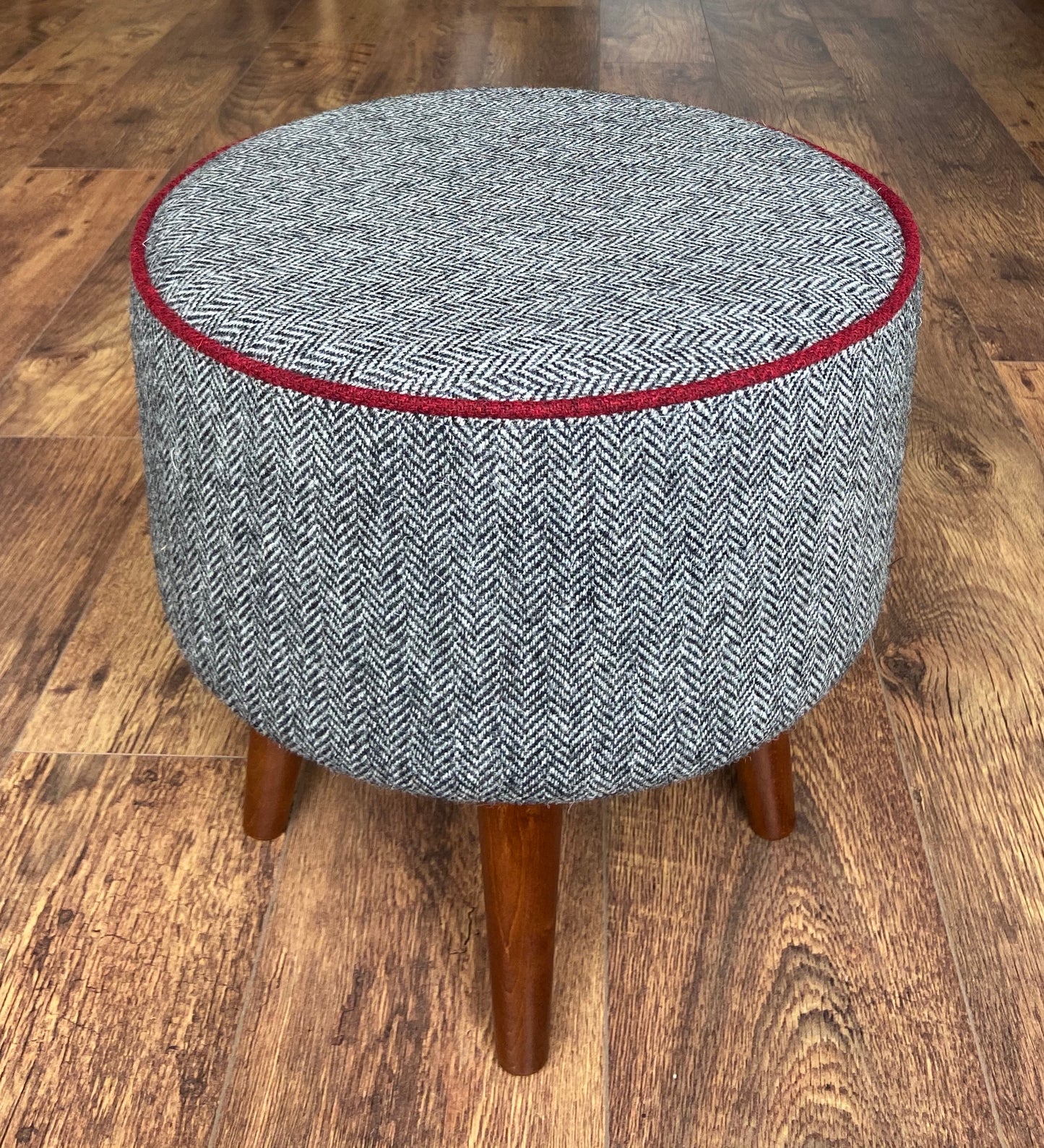 Black and White Harris Tweed Herringbone Footstool with Red Piping and Dark Varnished Wooden Legs