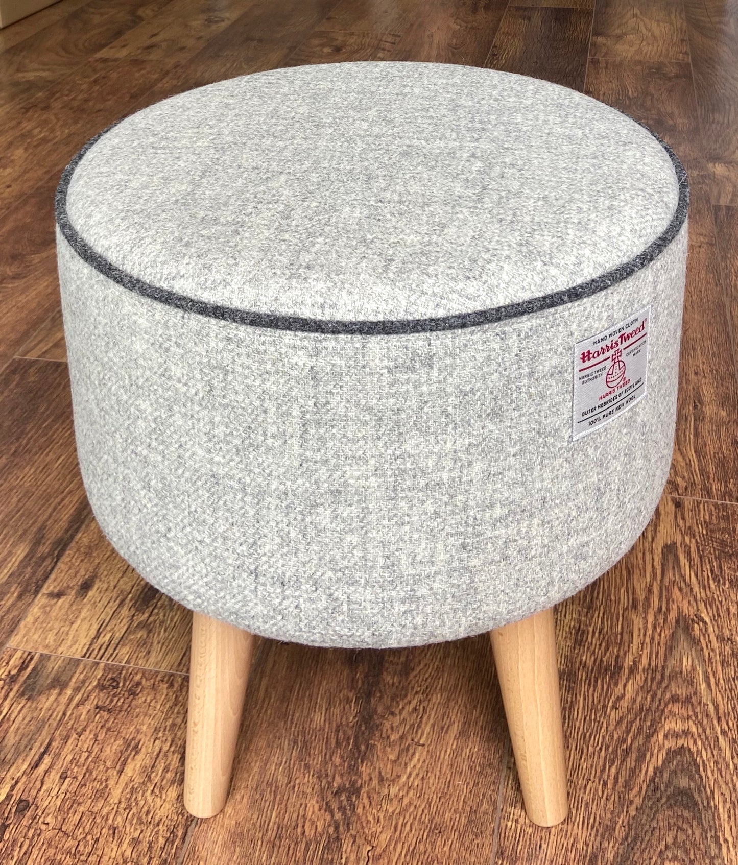 Grey Harris Tweed Footstool with Charcoal Piping and Varnished Wooden Legs