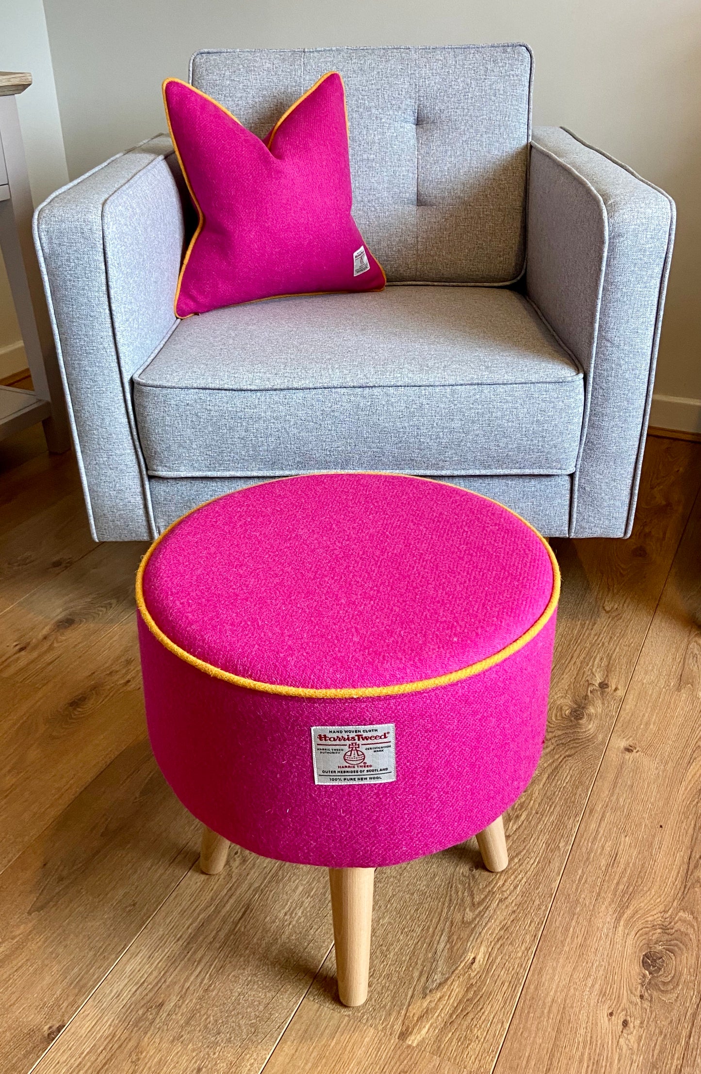 Pink Harris Tweed Footstool with Yellow Piping and Varnished Wooden Legs