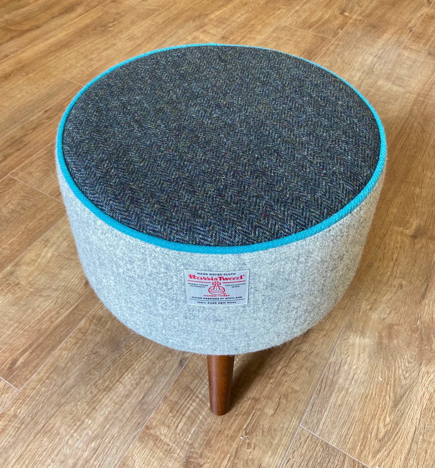 Grey and Charcoal Harris Tweed Footstool with Turquoise Piping and Dark Varnished Wooden Legs