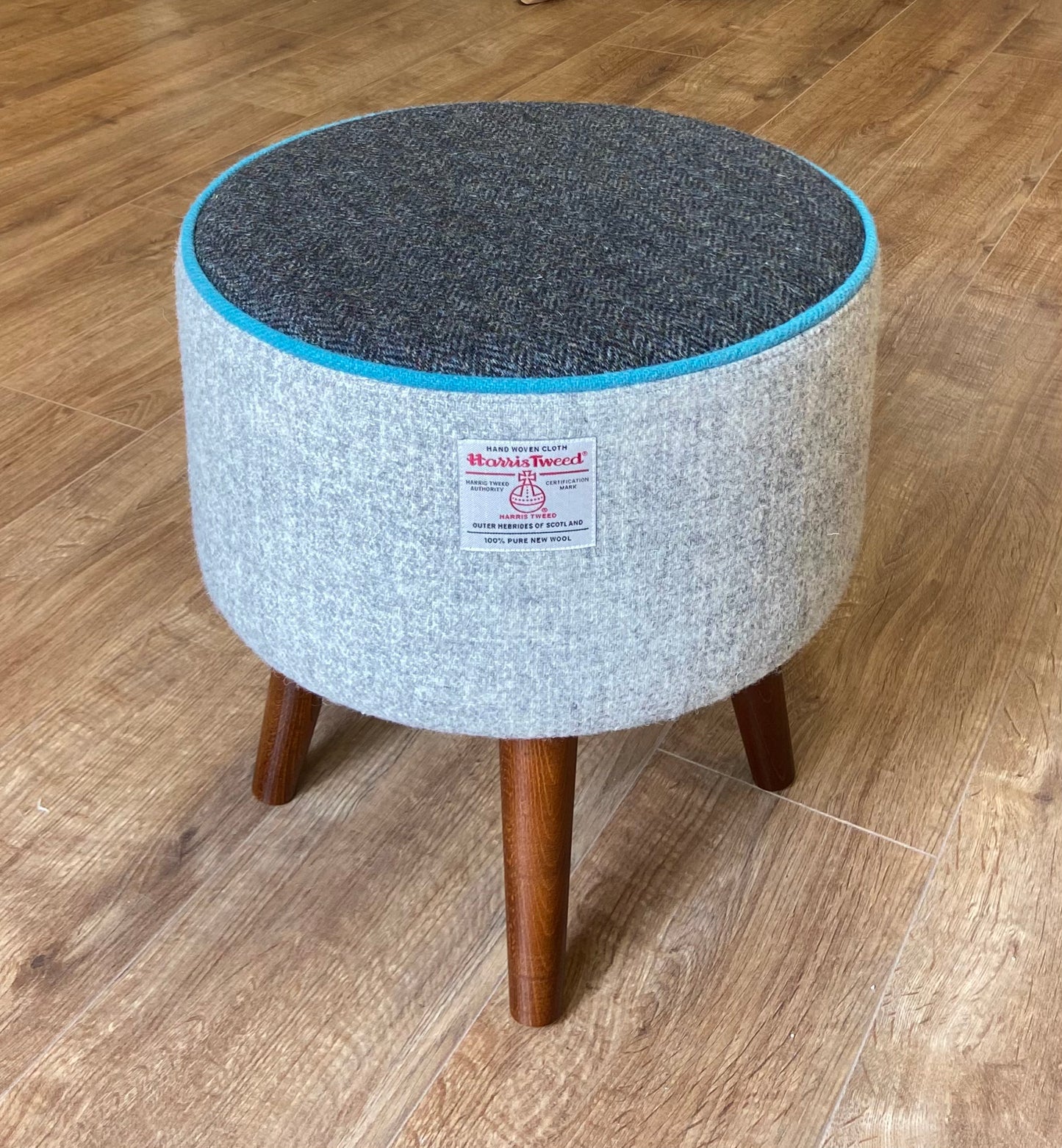 Grey and Charcoal Harris Tweed Footstool with Turquoise Piping and Dark Varnished Wooden Legs