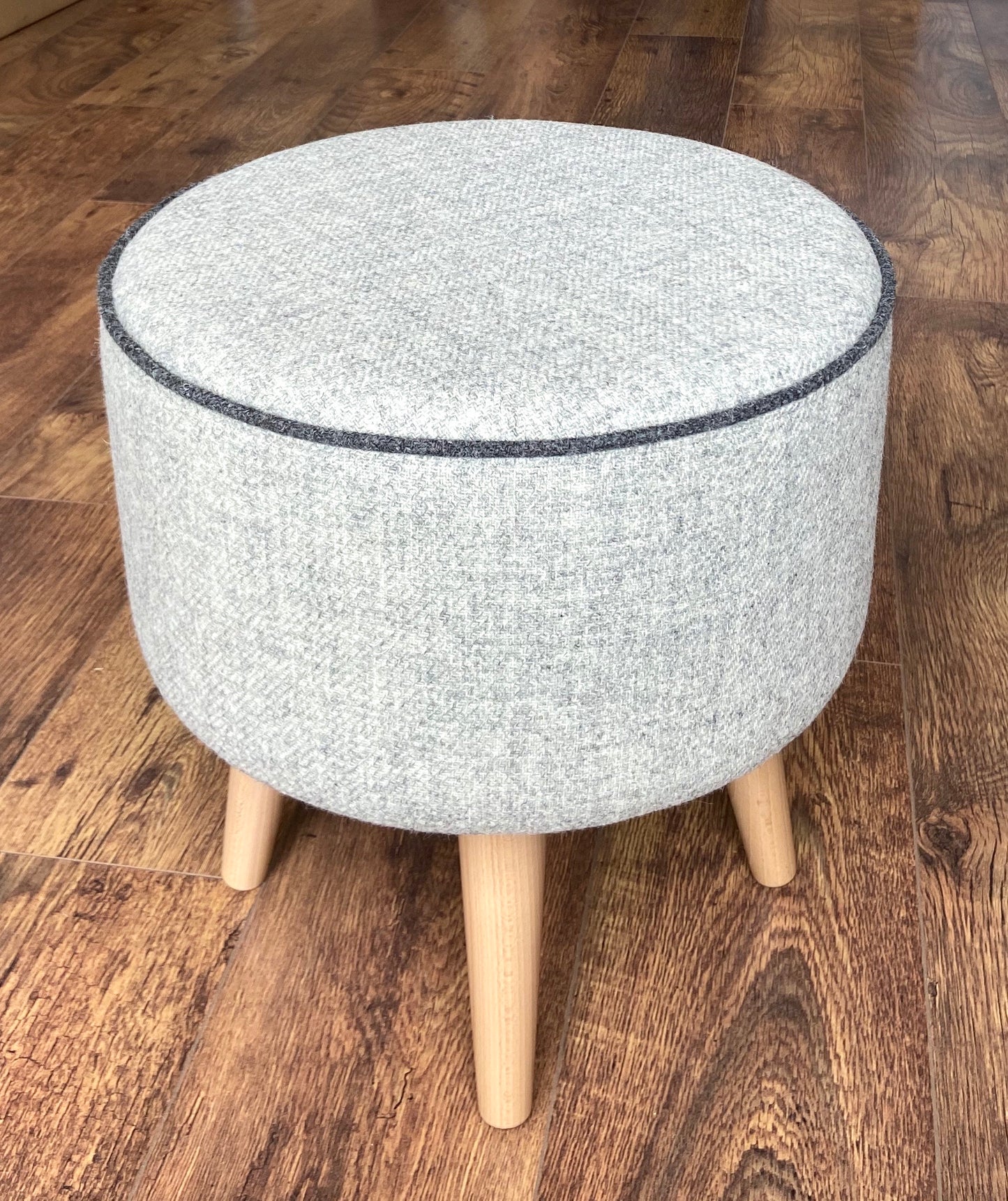 Grey Harris Tweed Footstool with Charcoal Piping and Varnished Wooden Legs