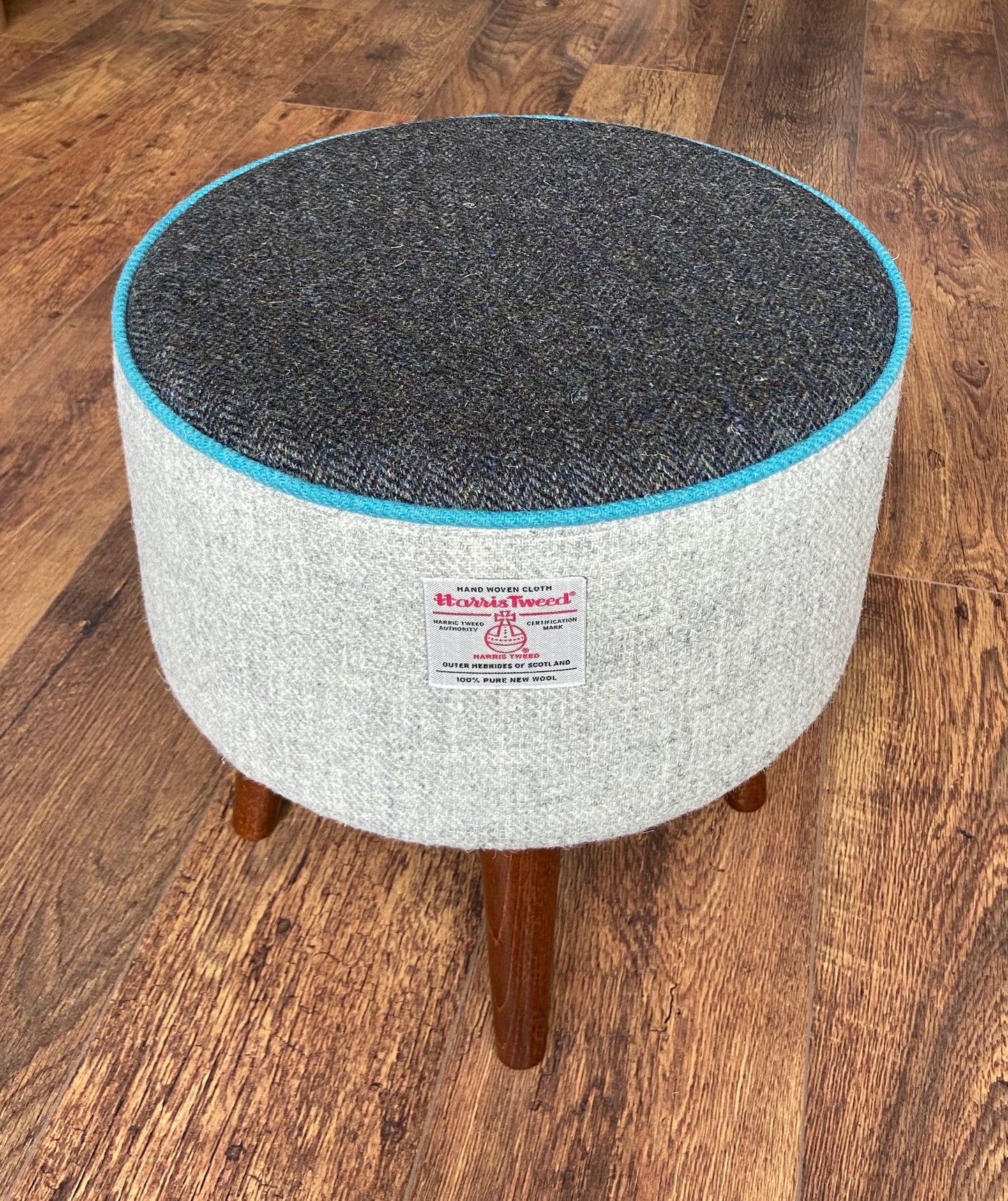 Grey and Charcoal Harris Tweed Footstool with Turquoise Piping and Dark Varnished Wooden Legs