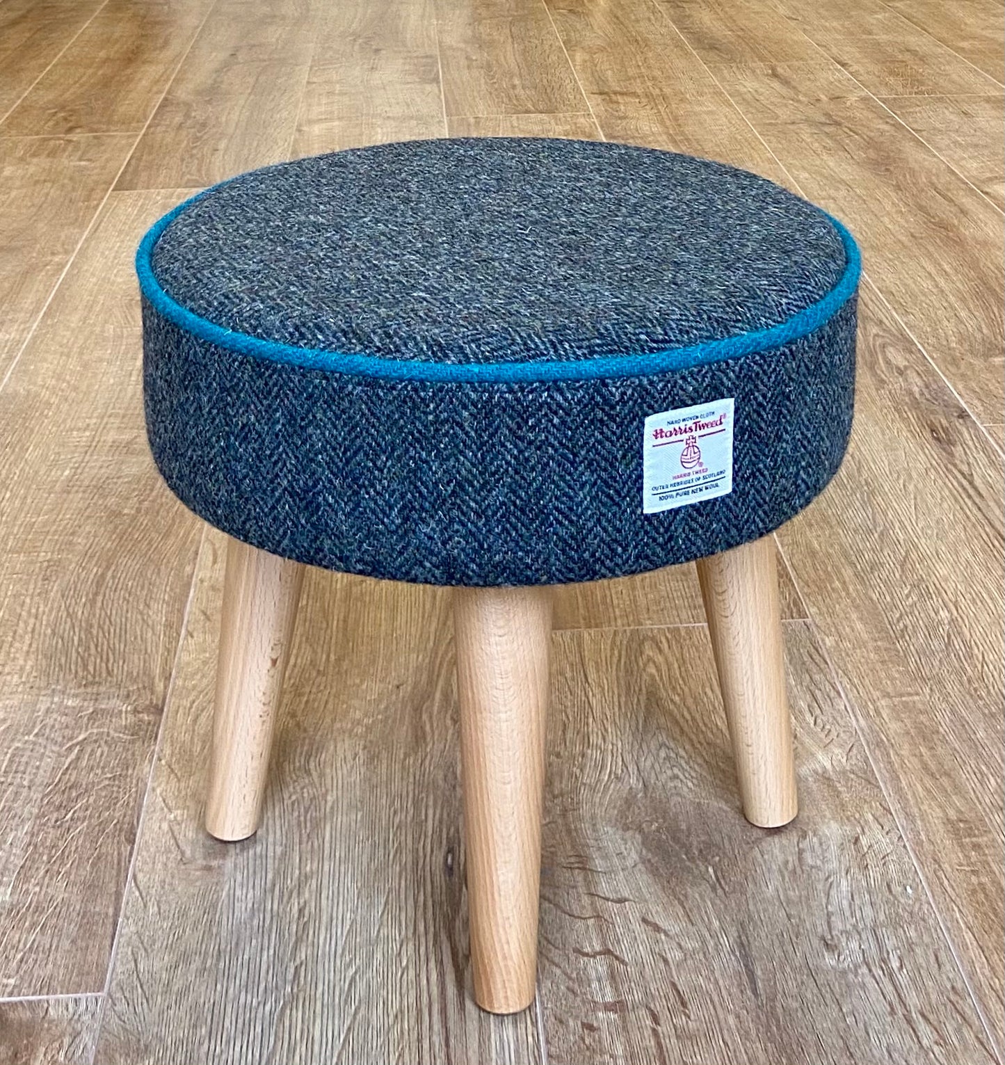 Charcoal Harris Tweed Footstool with Teal Piping and Varnished Wooden Legs