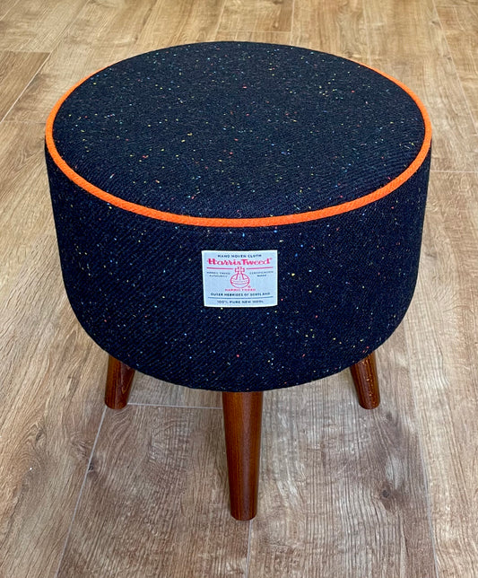 Black Speckled Harris Tweed Footstool with Orange Piping and Dark Varnished Wooden Legs