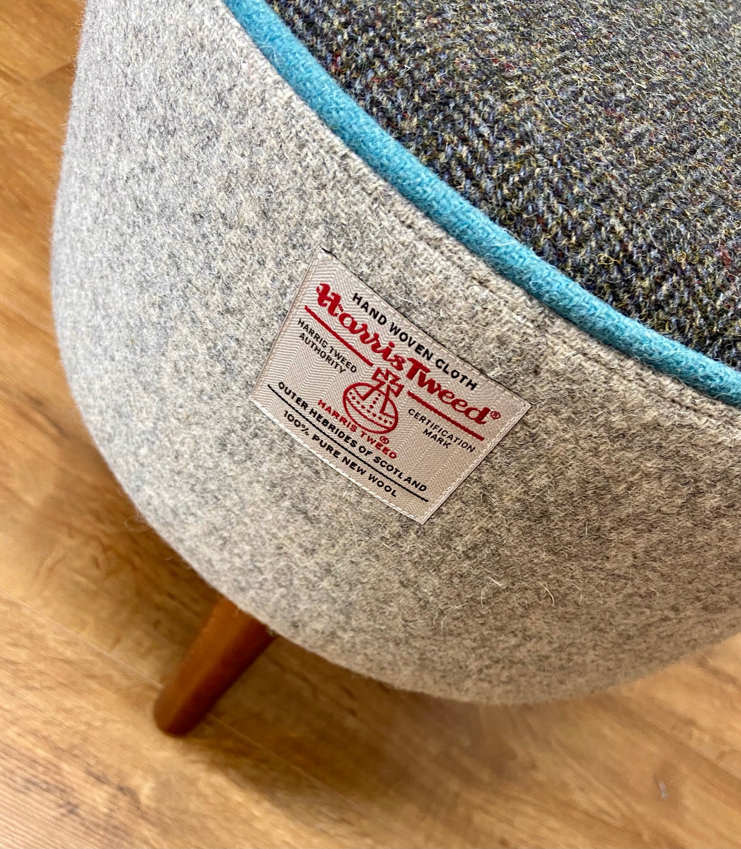 Grey and Charcoal Harris Tweed Footstool with Turquoise Piping and Dark Varnished Wooden Legs