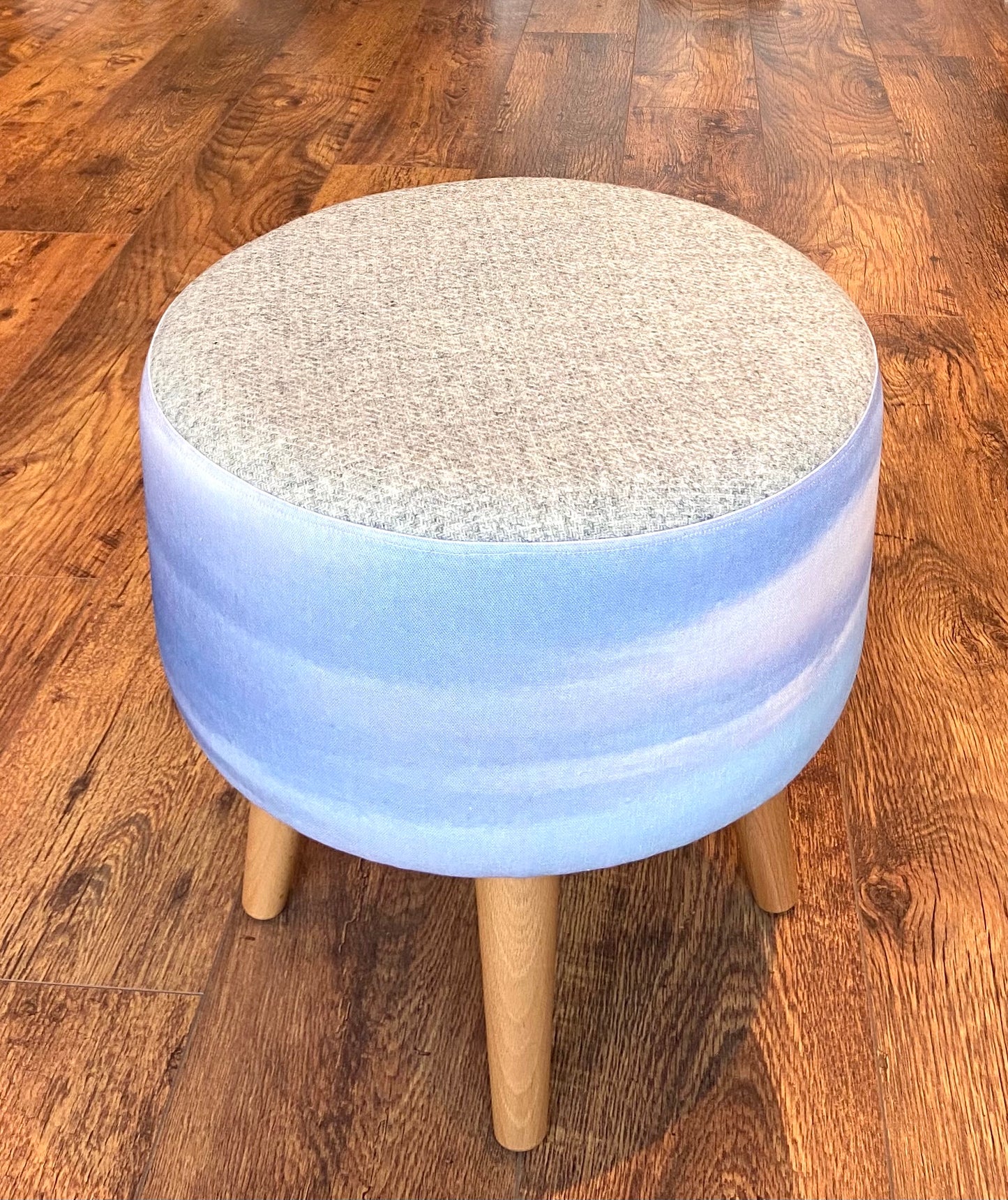 Watercolour Sky and Grey Harris Tweed Footstool with Varnished Wooden Legs