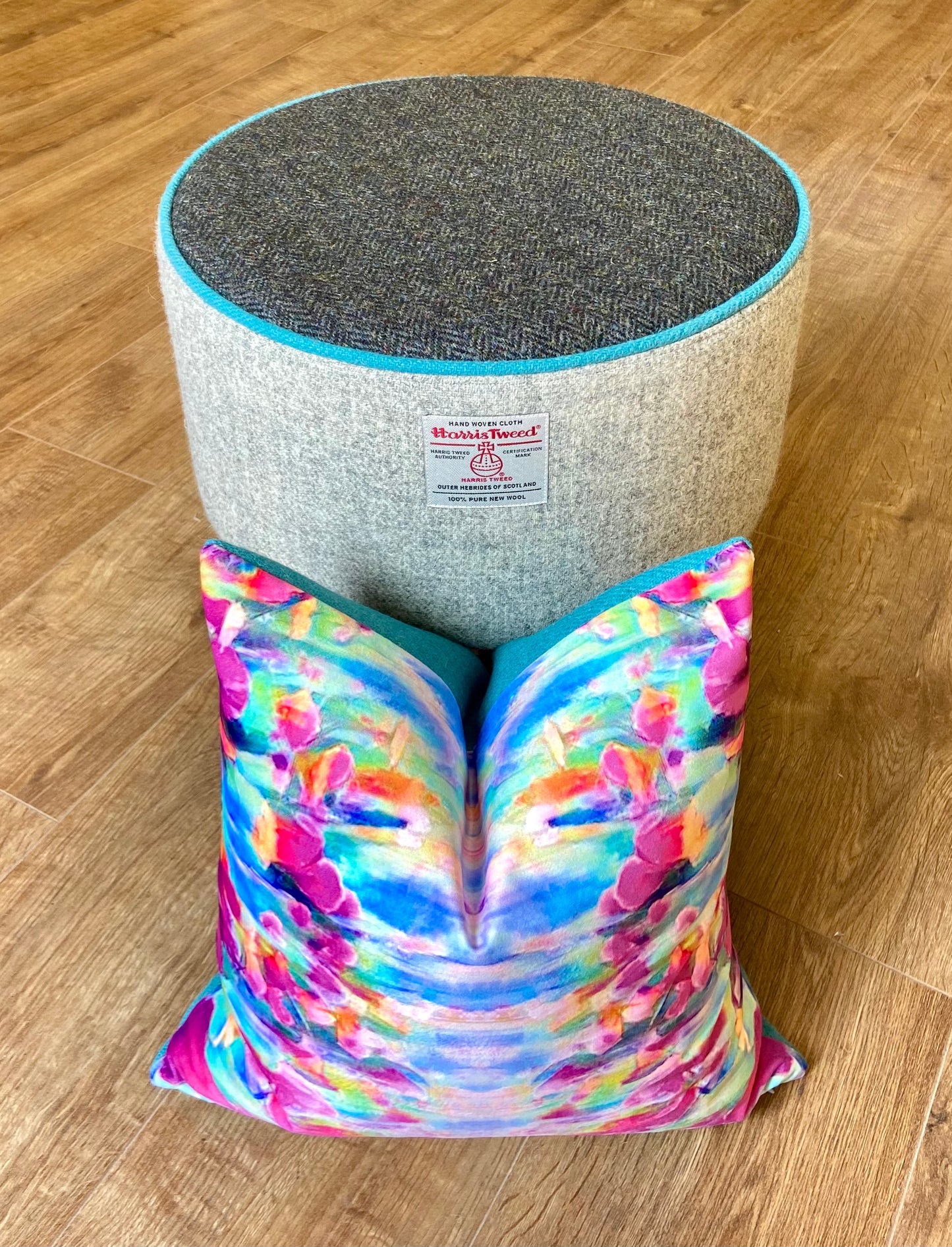 Grey and Charcoal Harris Tweed Footstool with Turquoise Piping and Dark Varnished Wooden Legs