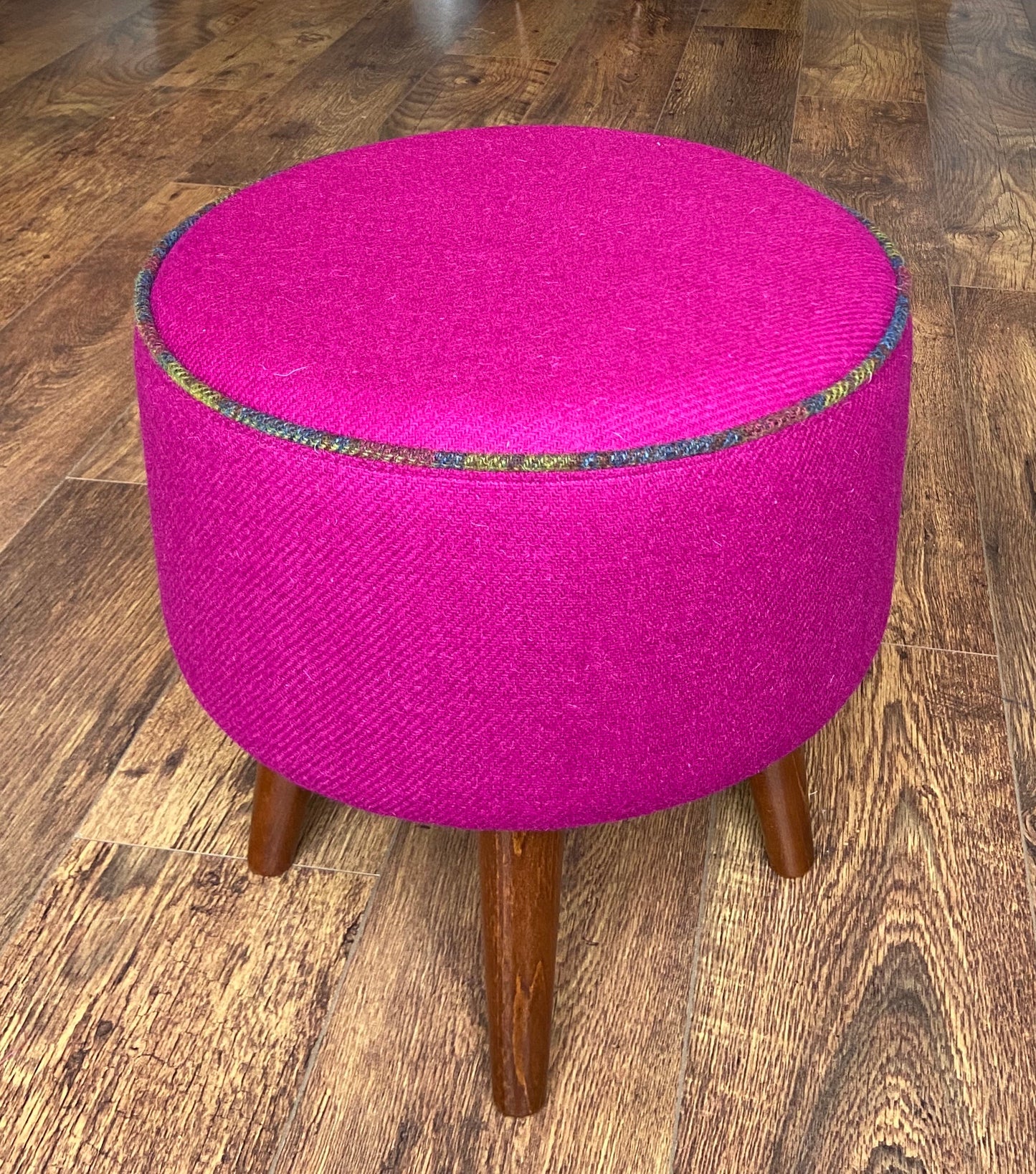 Fuchsia Harris Tweed Footstool with Tartan Piping and Dark Varnished Wooden Legs