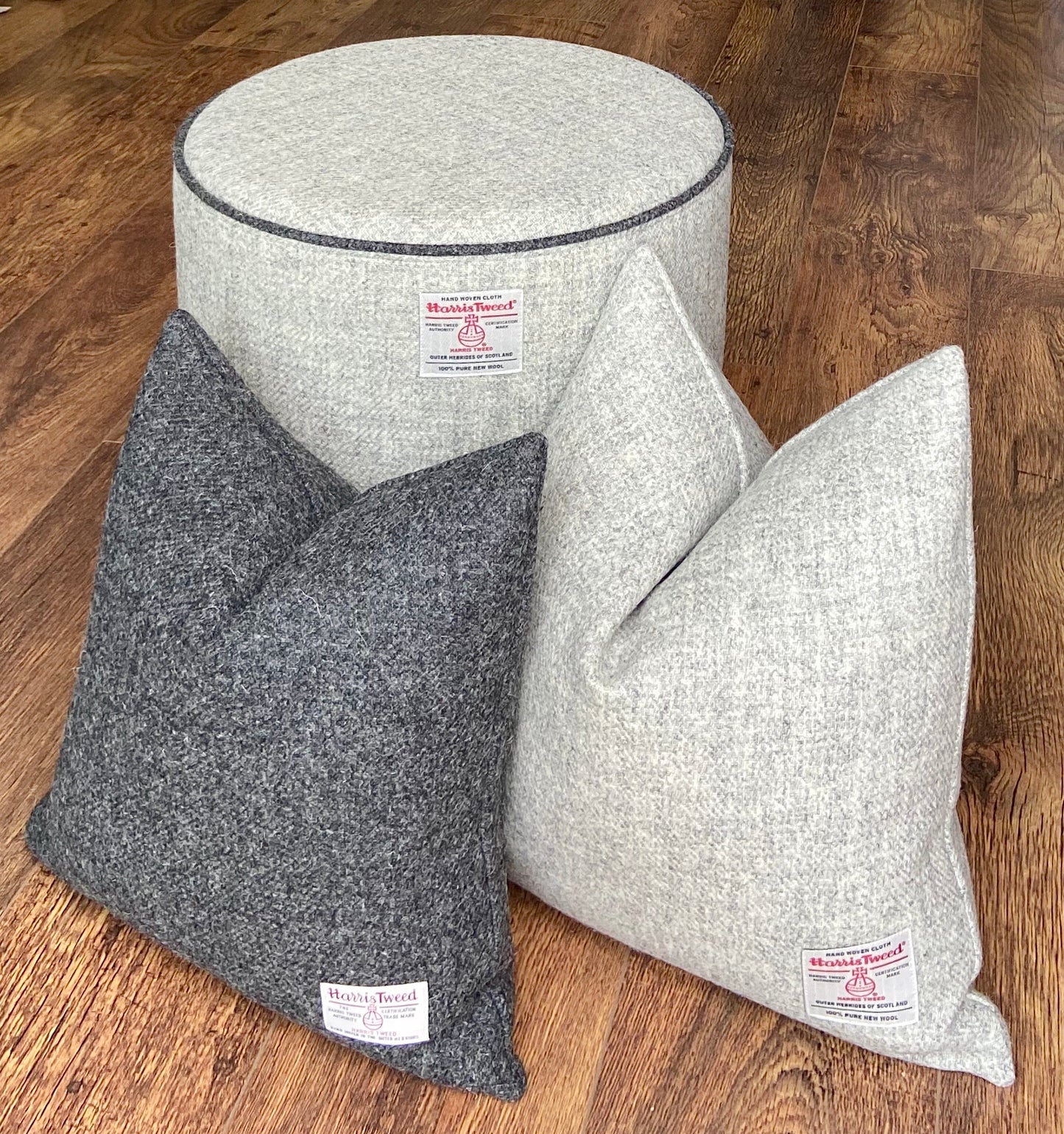 Grey Harris Tweed Footstool with Charcoal Piping and Varnished Wooden Legs