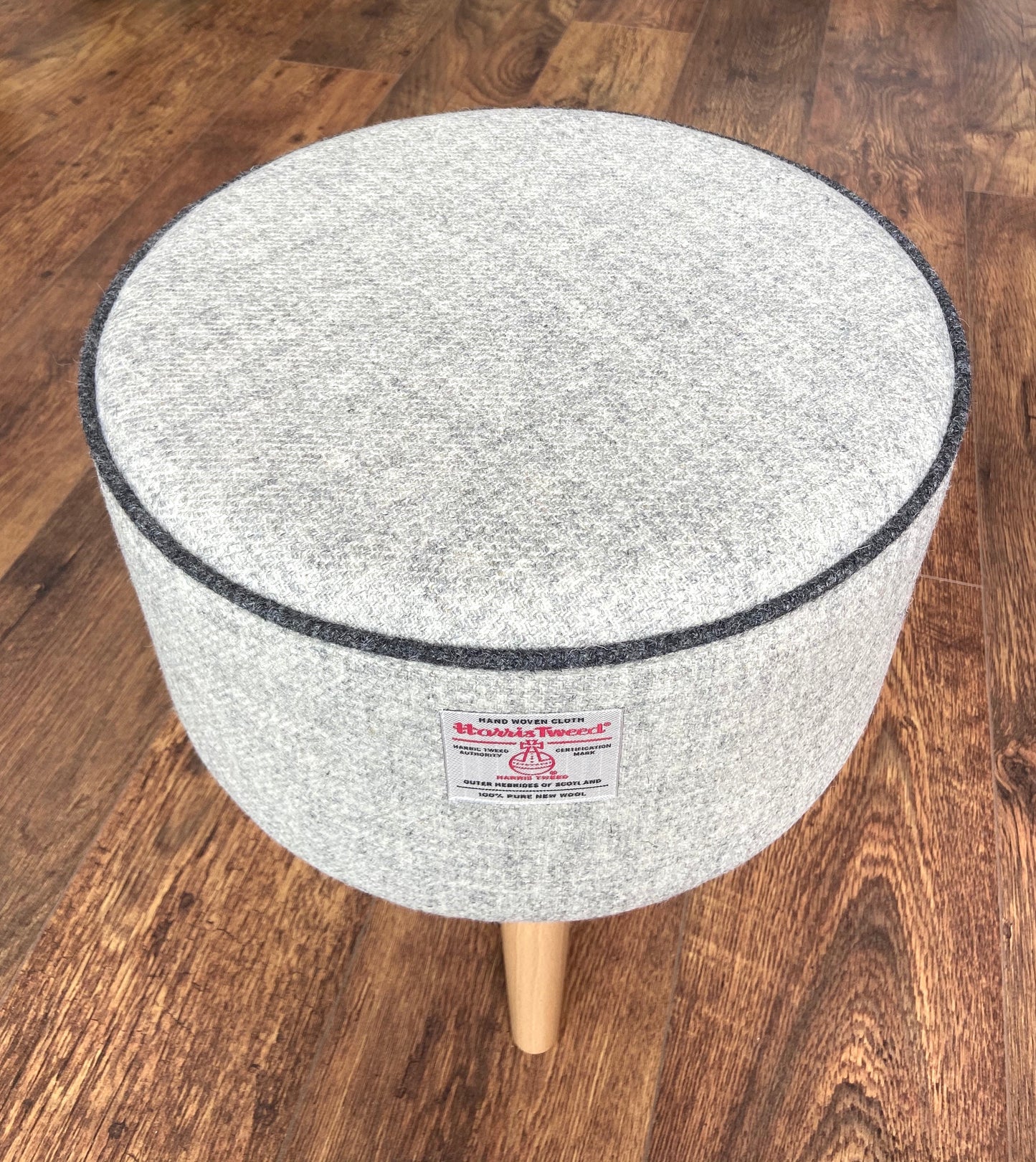 Grey Harris Tweed Footstool with Charcoal Piping and Varnished Wooden Legs