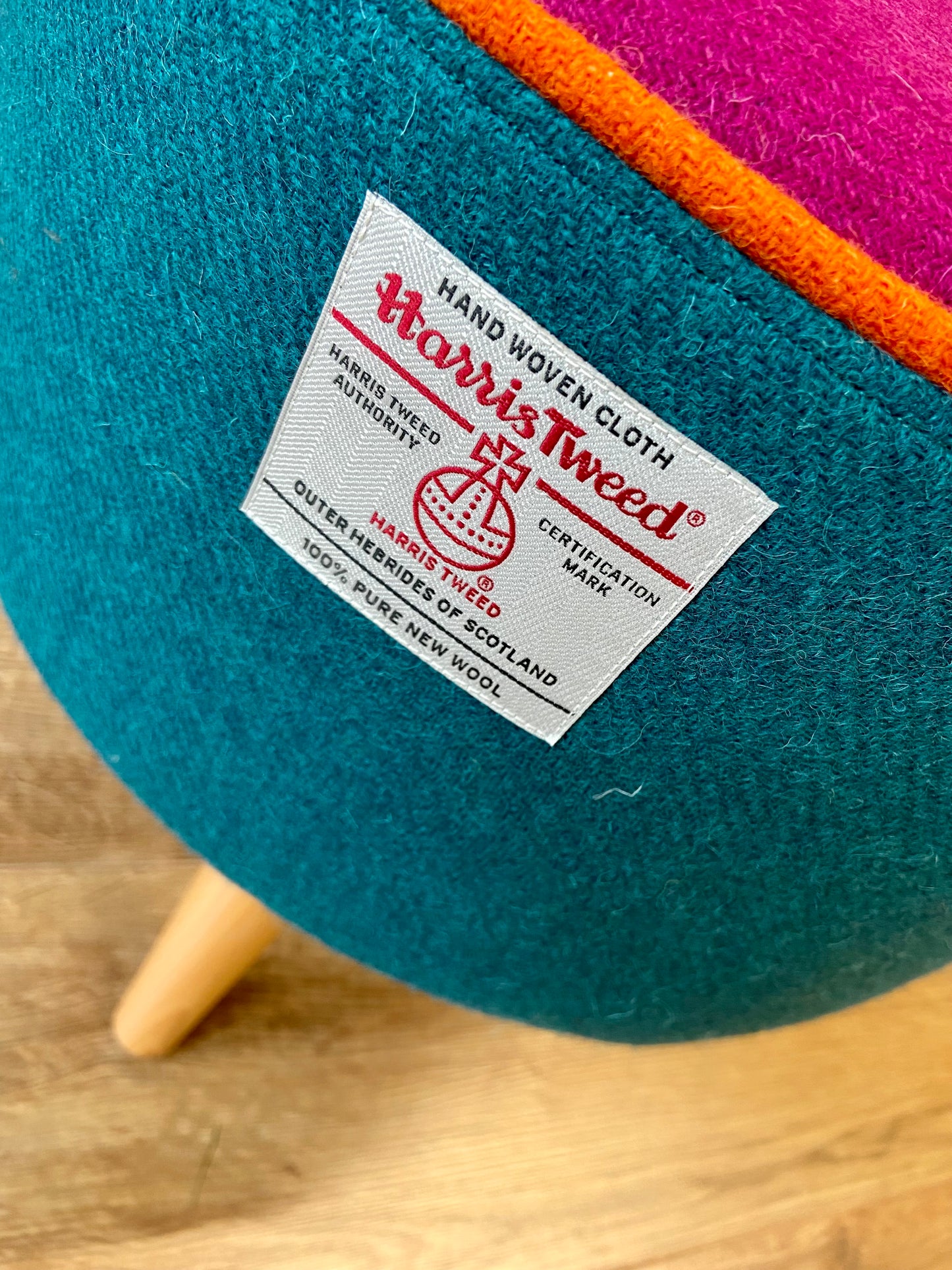 Teal and Fuchsia Harris Tweed Footstool with Orange Piping and Varnished Wooden Legs