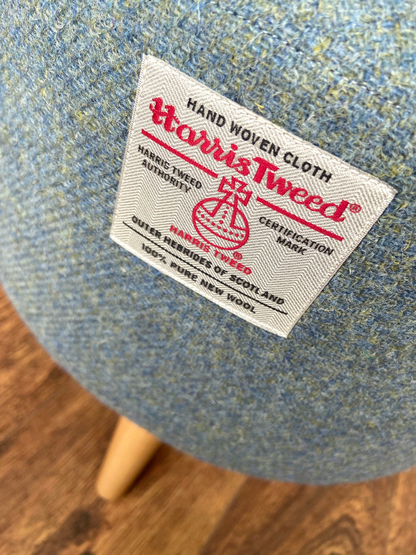 Light Blue Harris Tweed Round Footstool with Varnished Wooden Legs