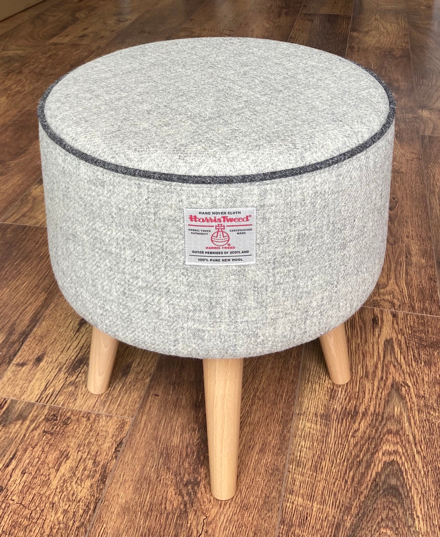 Grey Harris Tweed Footstool with Charcoal Piping and Varnished Wooden Legs