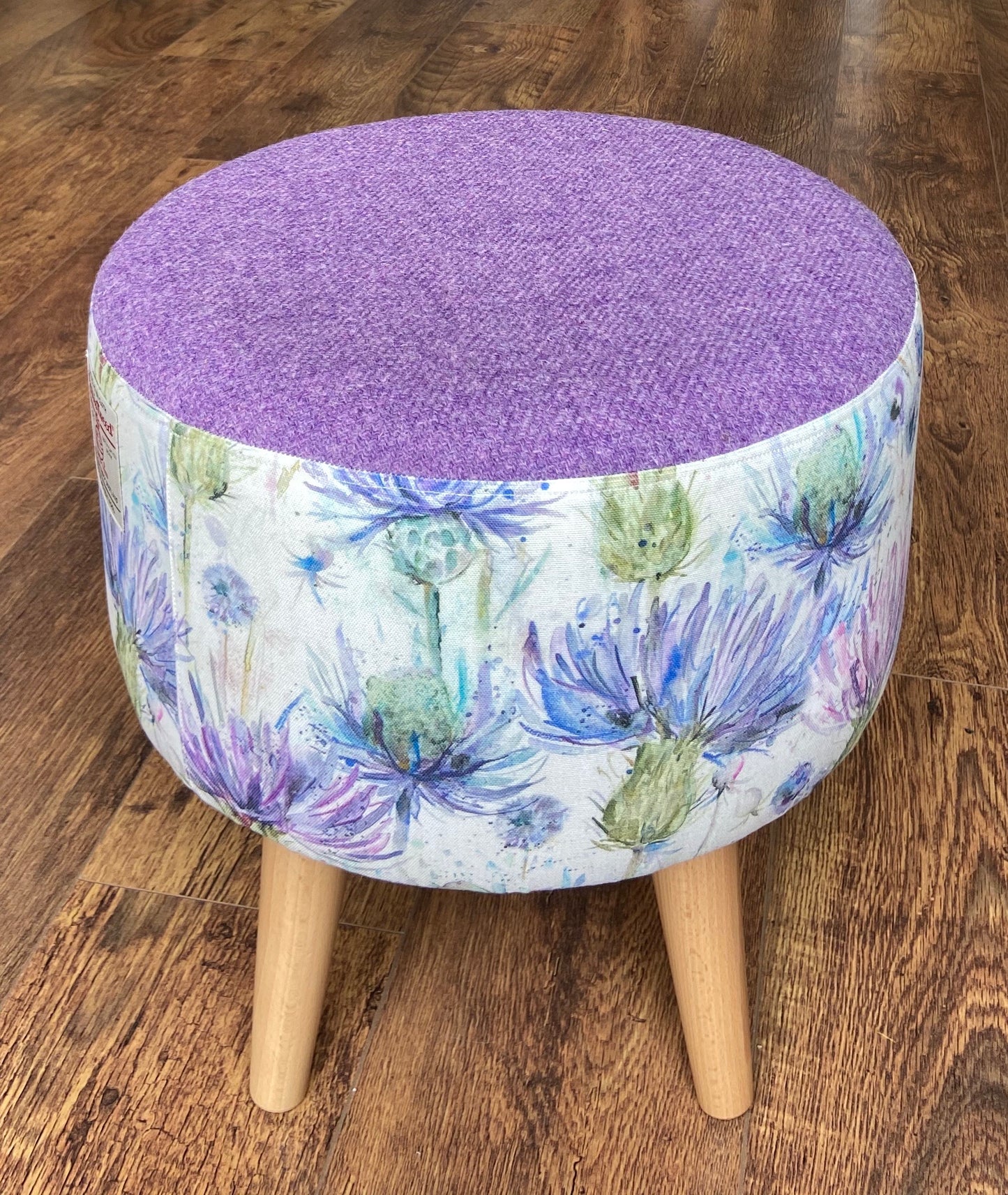 Watercolour Thistle Footstool with Lilac Harris Tweed and Varnished Wooden Legs